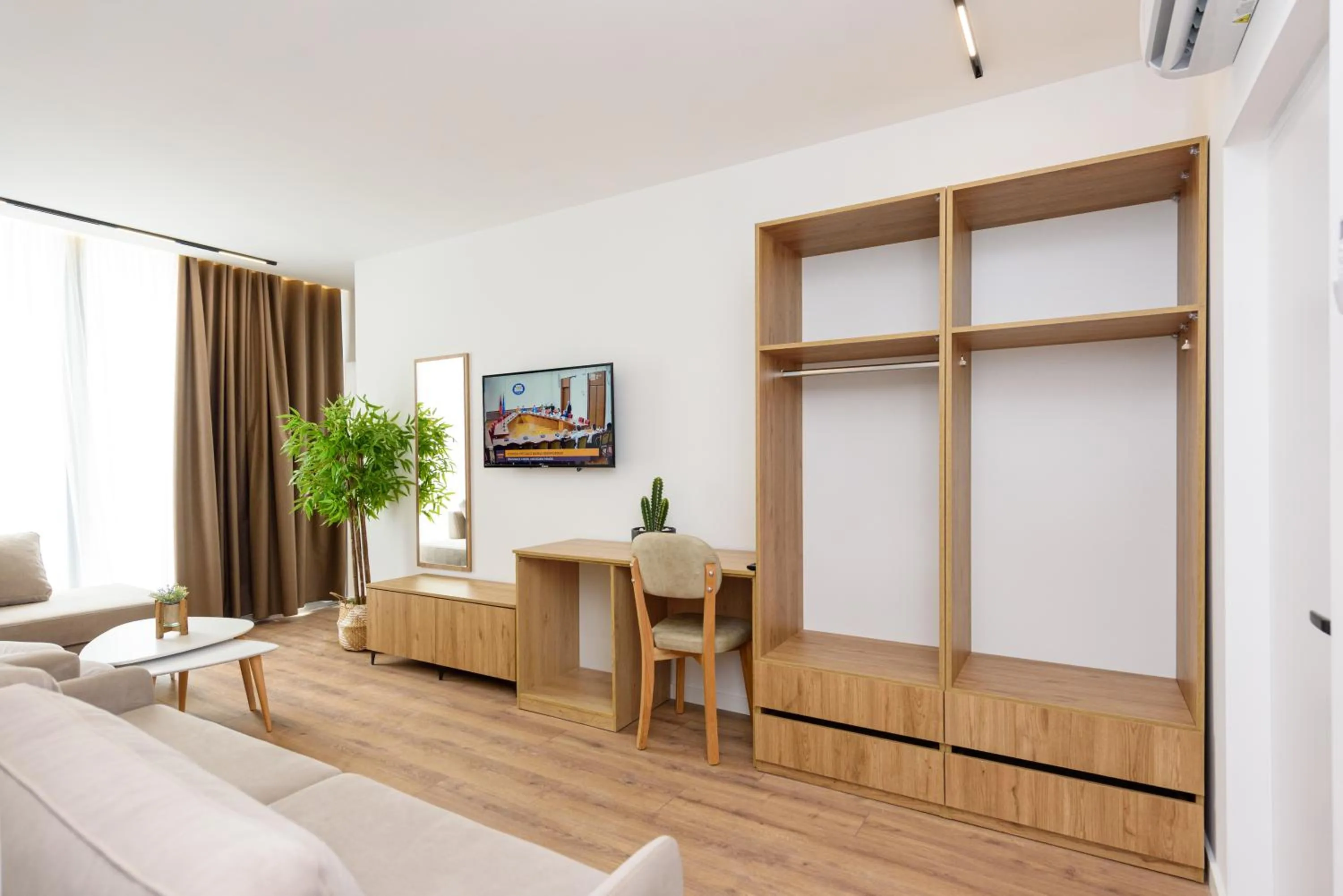 Communal lounge/ TV room in Sea & Sand Hotel