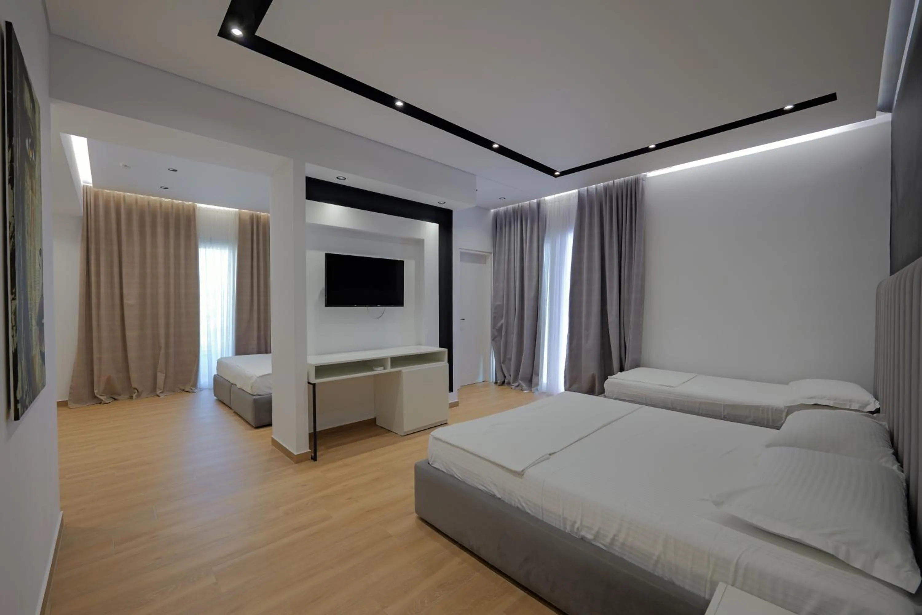 Communal lounge/ TV room, Bed in Sea & Sand Hotel