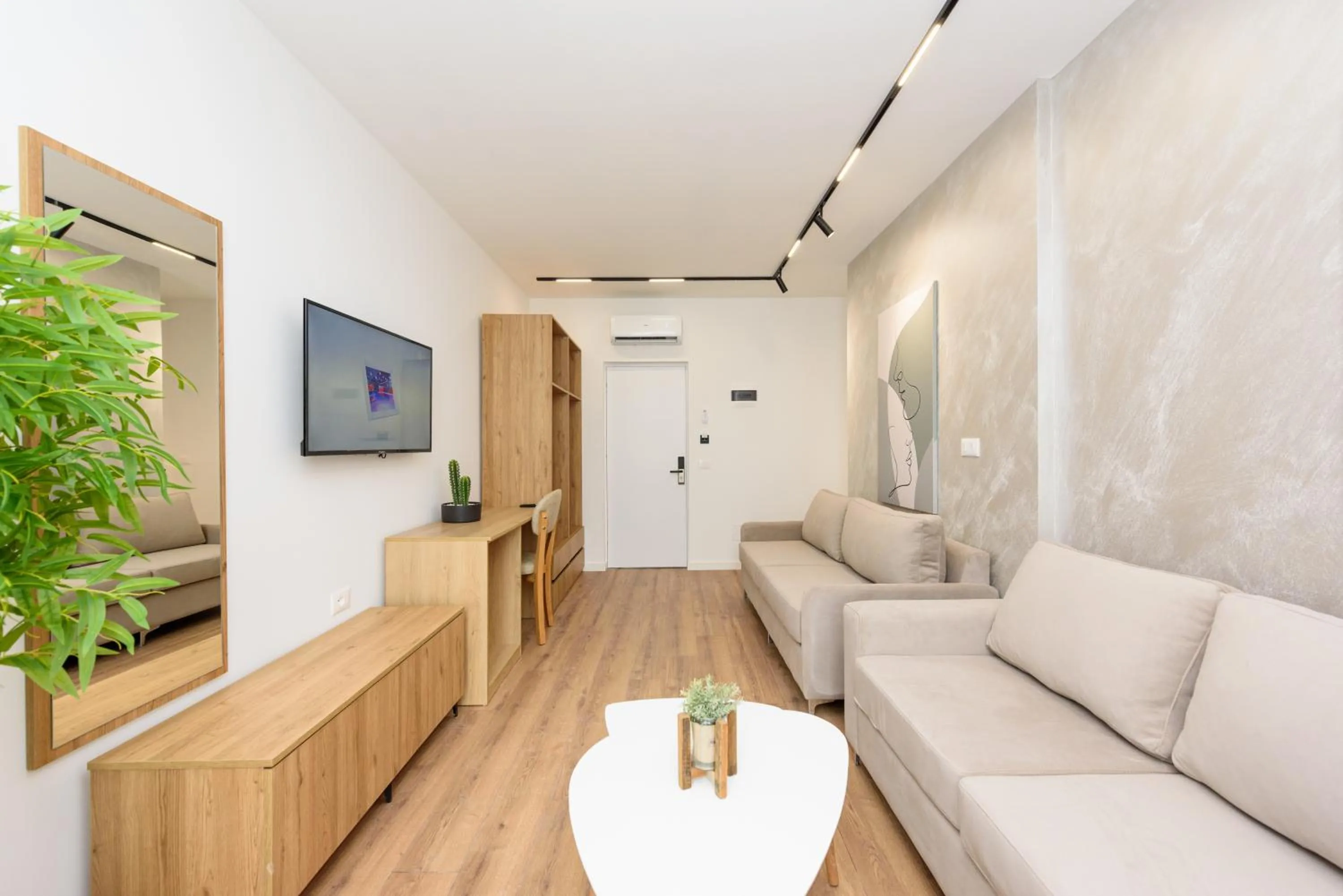 Communal lounge/ TV room in Sea & Sand Hotel