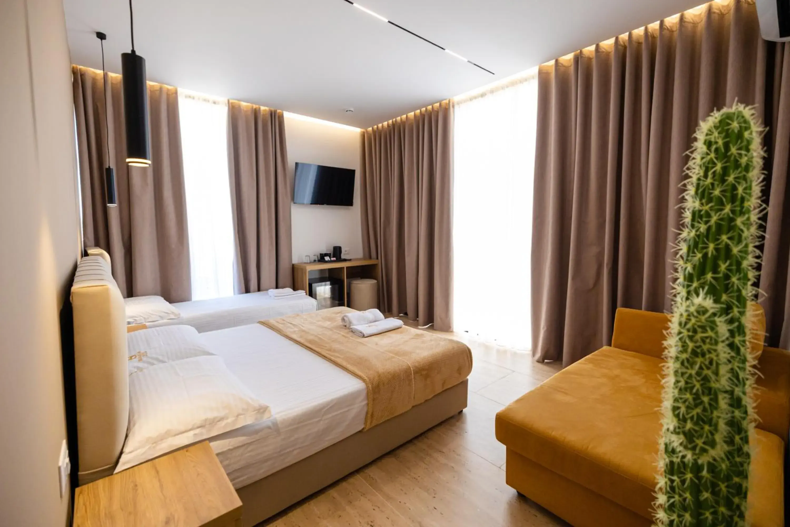 Deluxe Triple Room in Sea & Sand Hotel Deluxe Triple Room in Sea & Sand Hotel