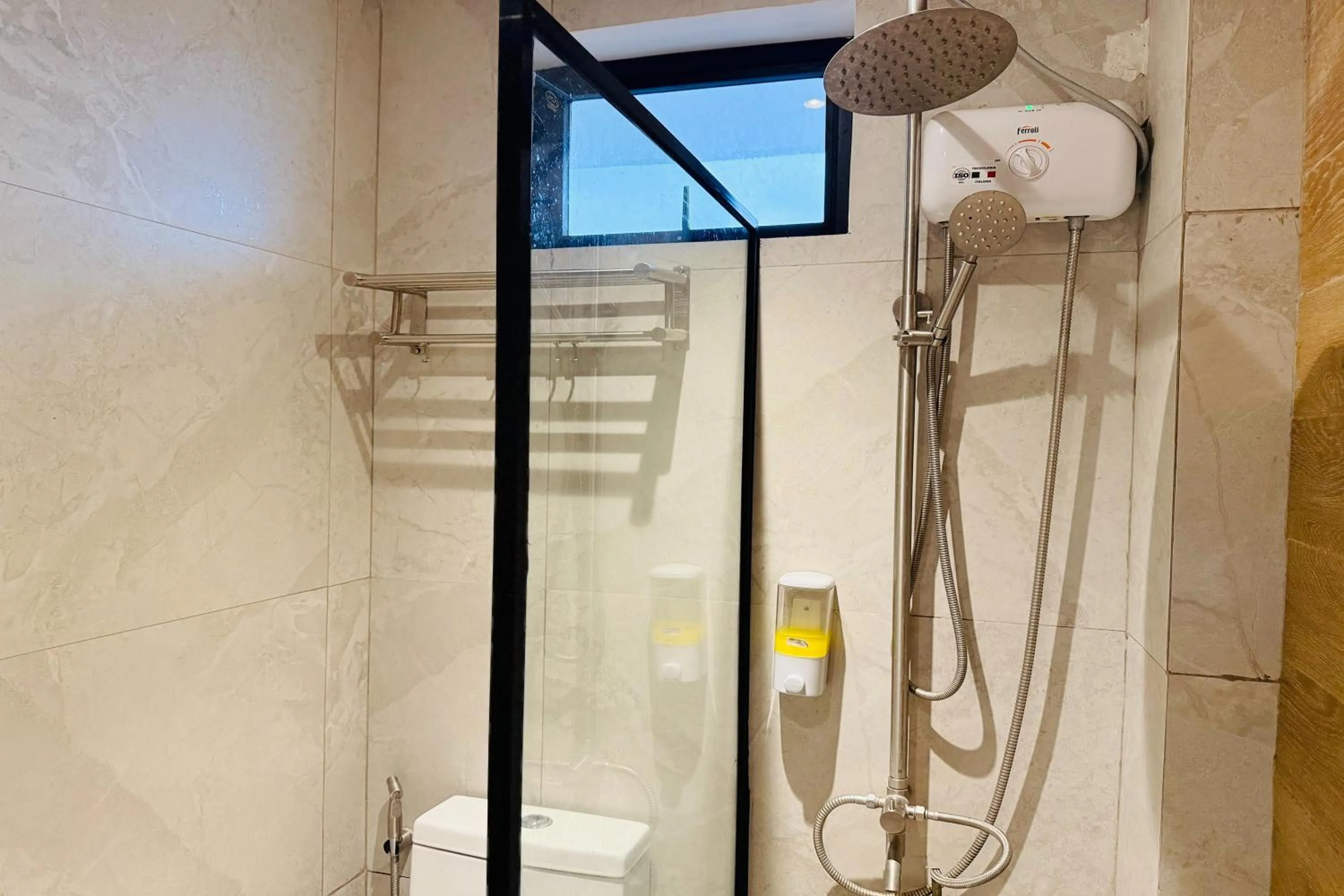 Shower in Aurora Suites Pasay near Airport