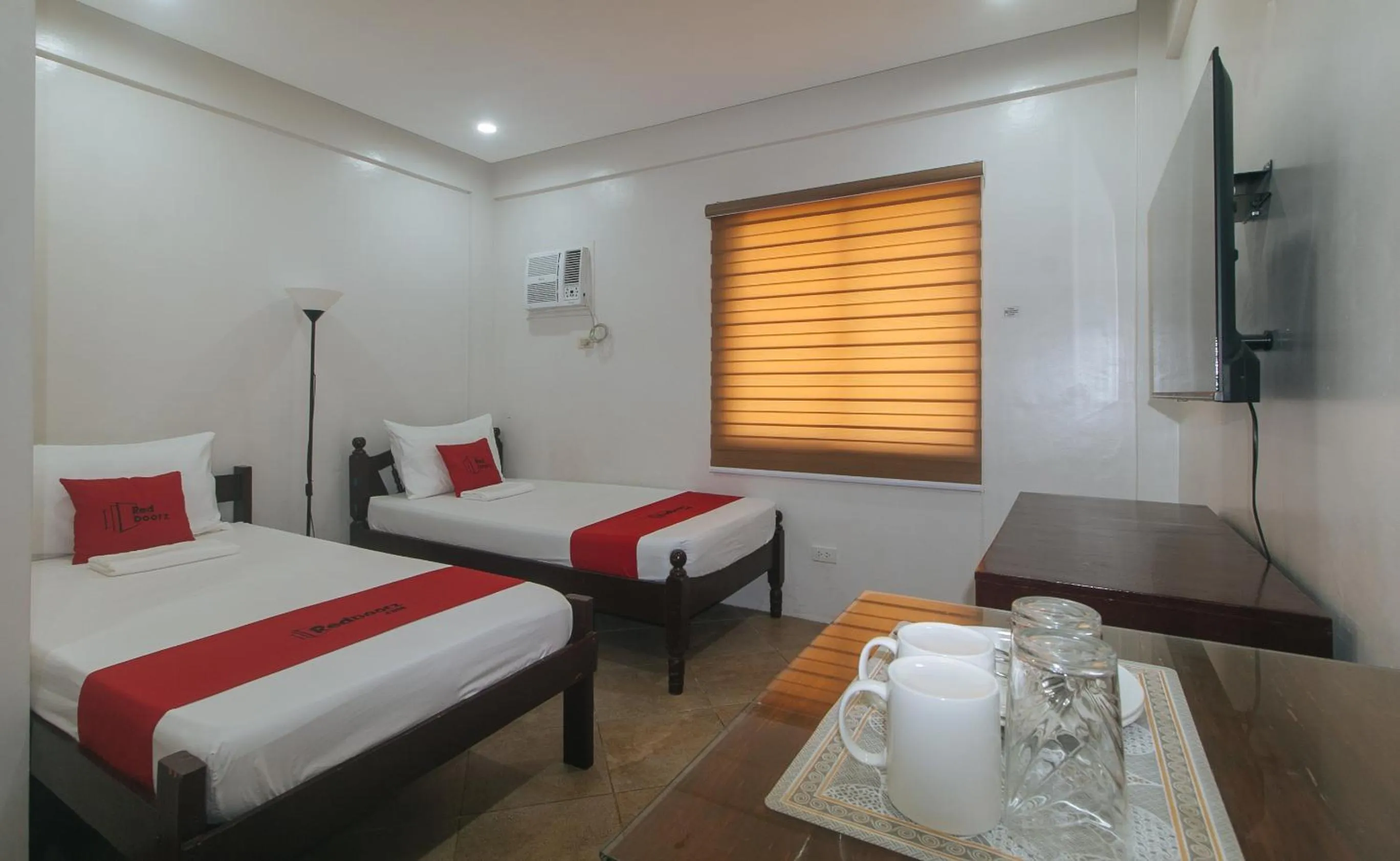 Bed in RedDoorz at Davids Travellers Inn Cavite