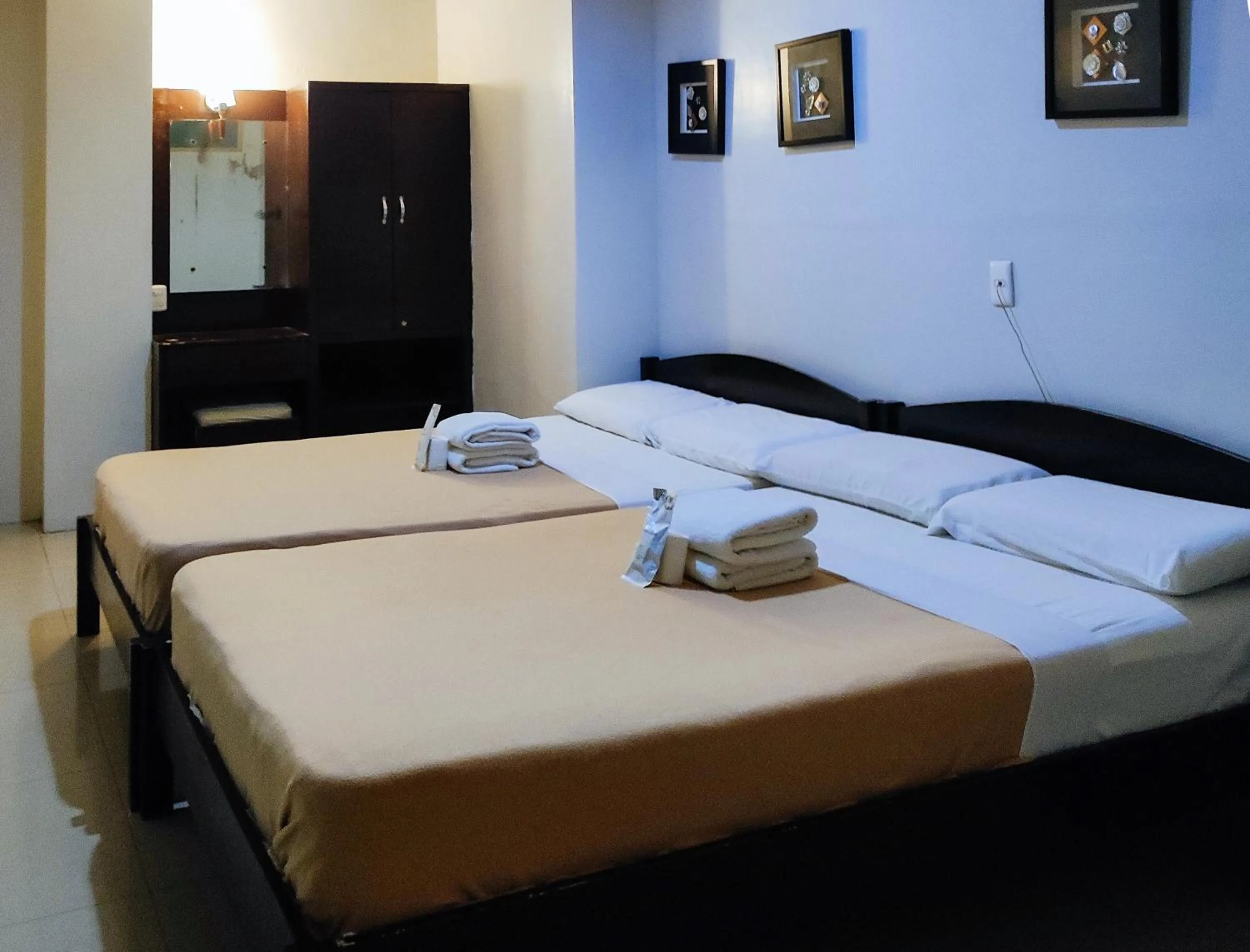 Bed in Jade Dragons Suites Davao