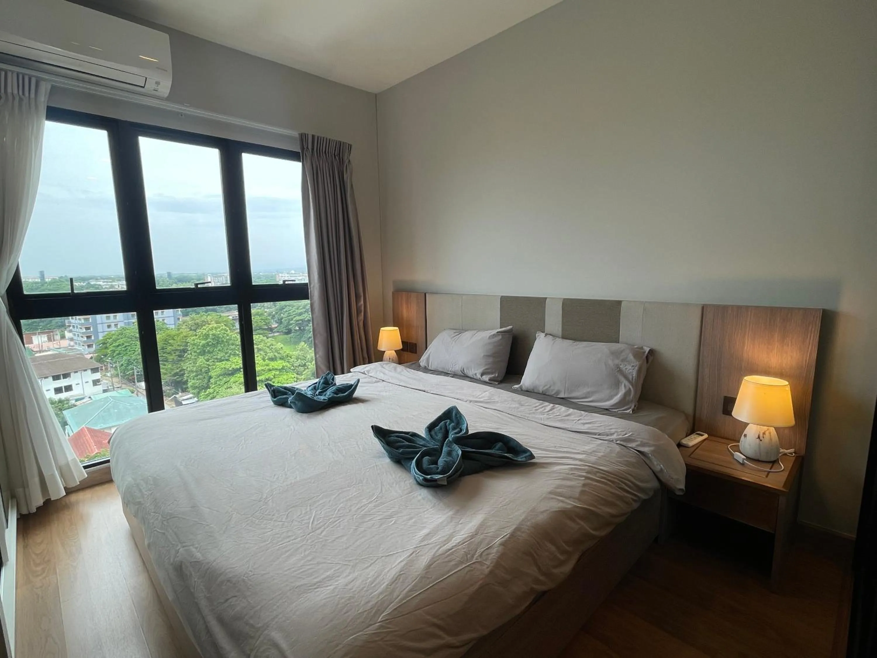 Bed in Astra Sky River Paronama Pool Luxury Changklan Chiang Mai