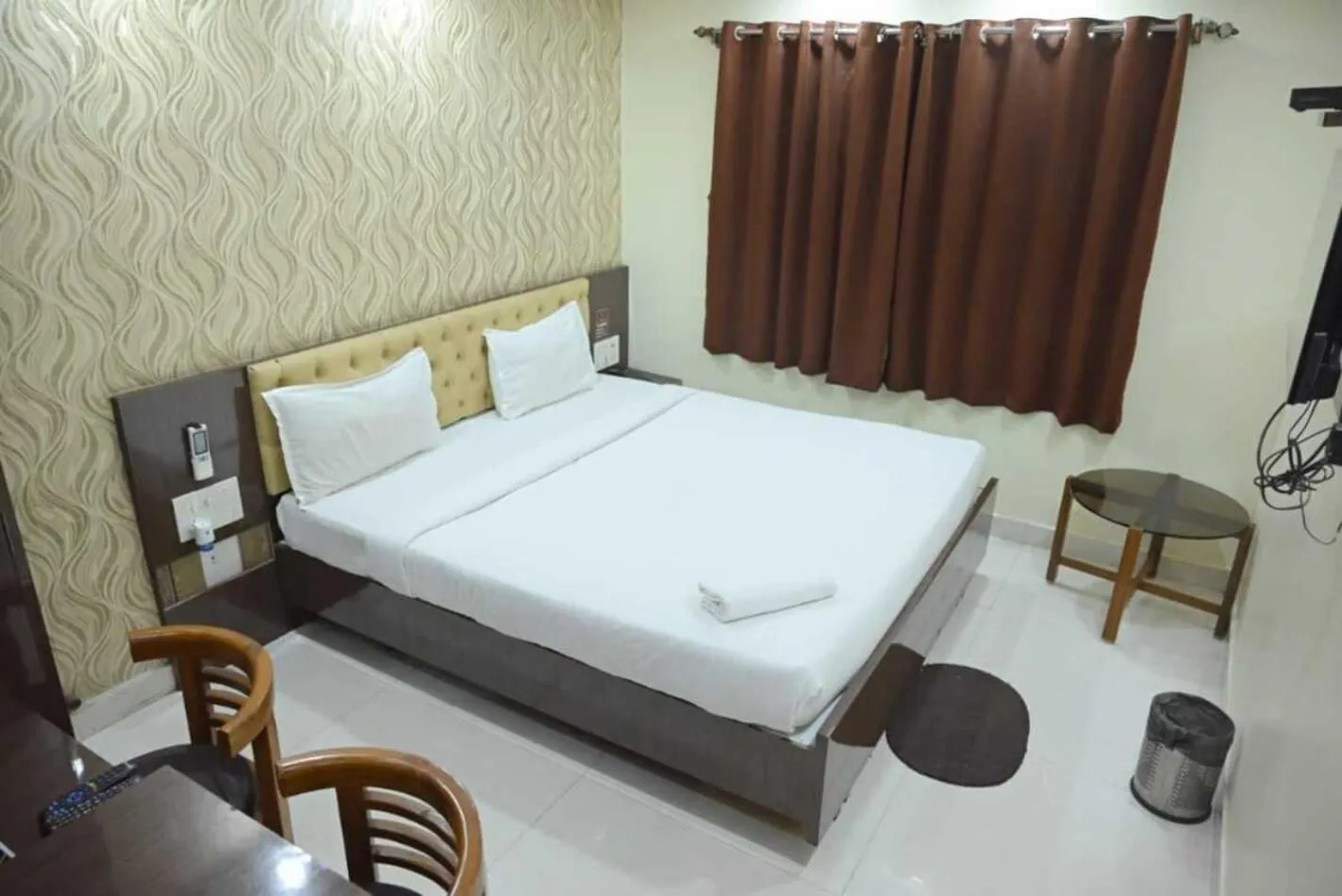 Bedroom in Hotel Jyoti International