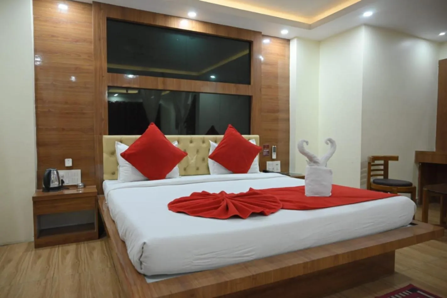 Bedroom in Hotel Jyoti International