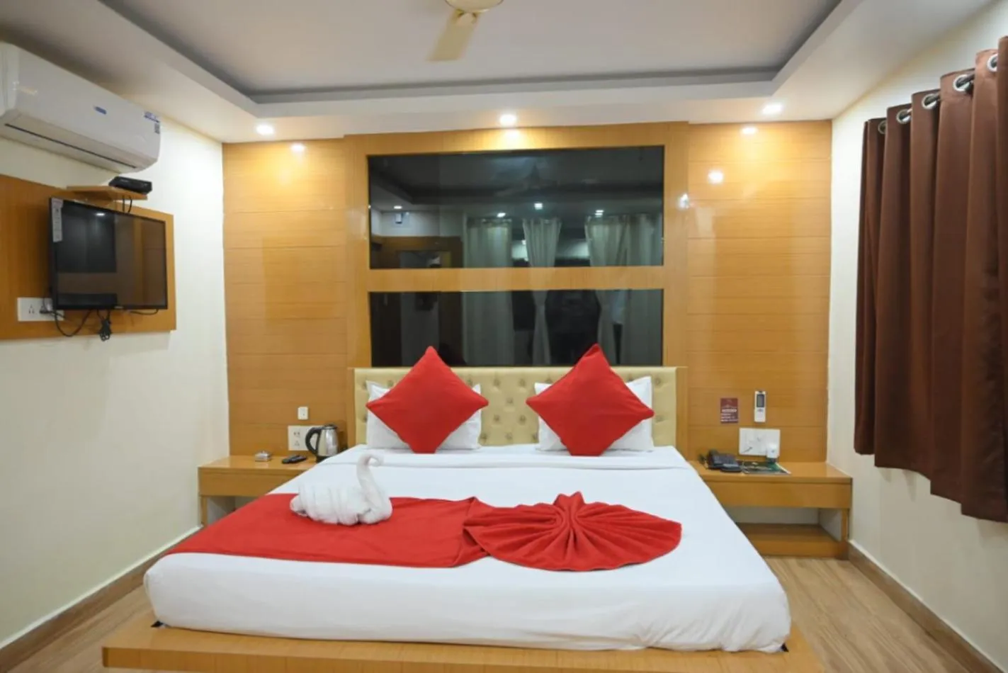 Bedroom in Hotel Jyoti International