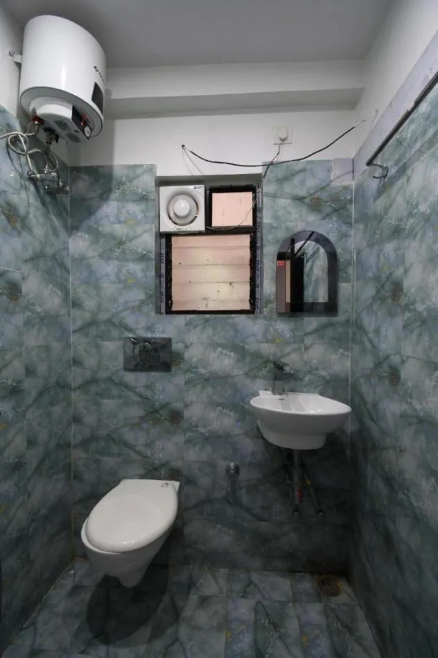 Bathroom in Hotel Jyoti International