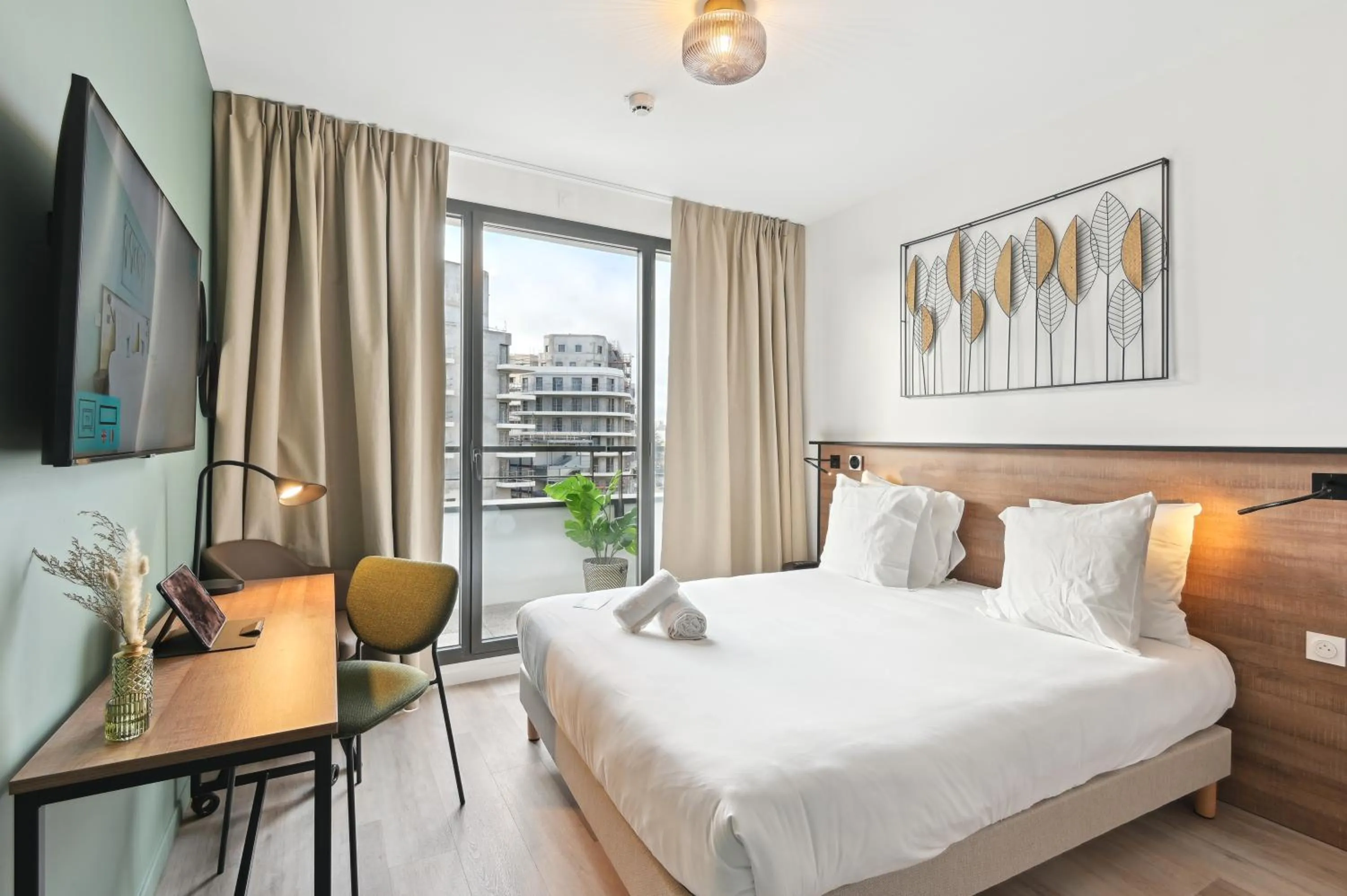 Bed in All Suites Paris Ouest Colombes