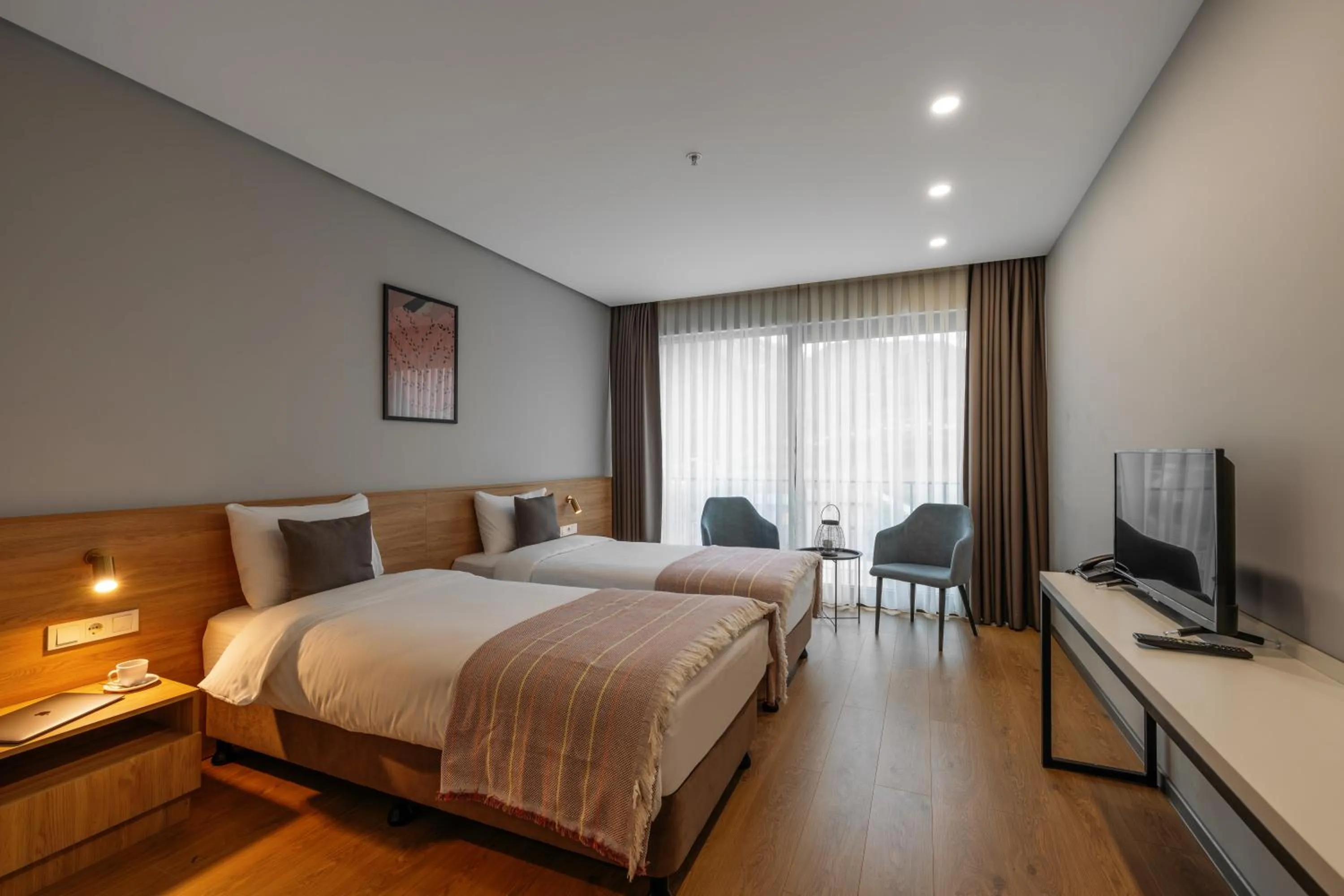 Bed in Hotel Memoir Kazbegi by DNT Group