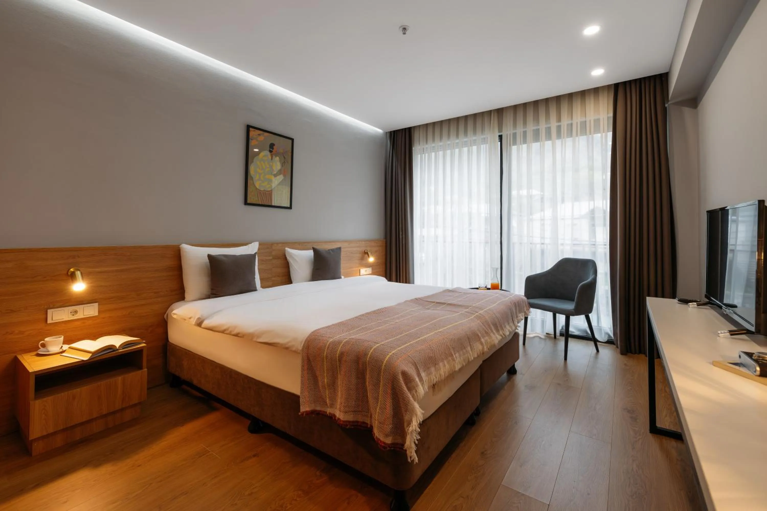 Bed in Hotel Memoir Kazbegi by DNT Group