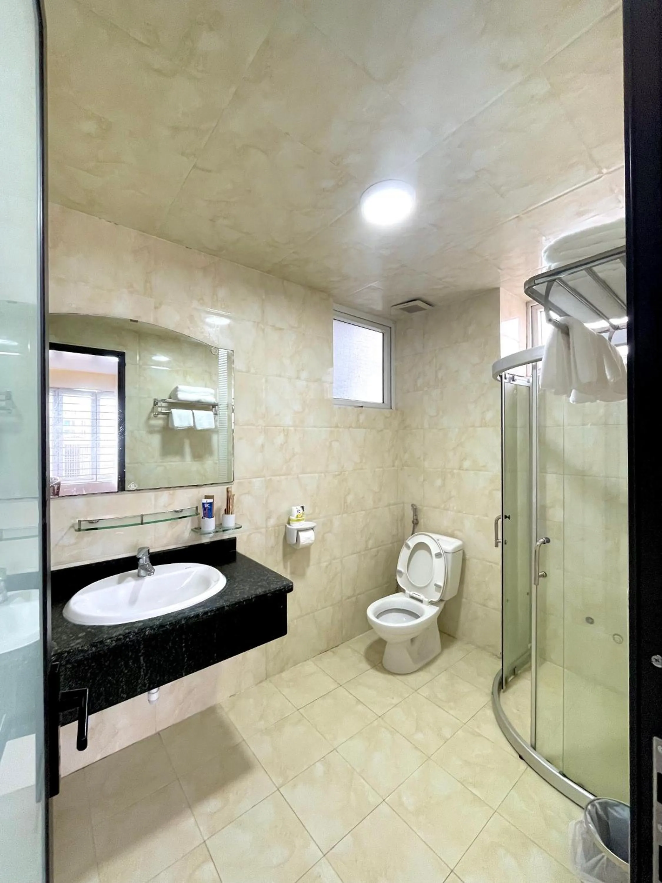 Shower in LIBRA HOTEL