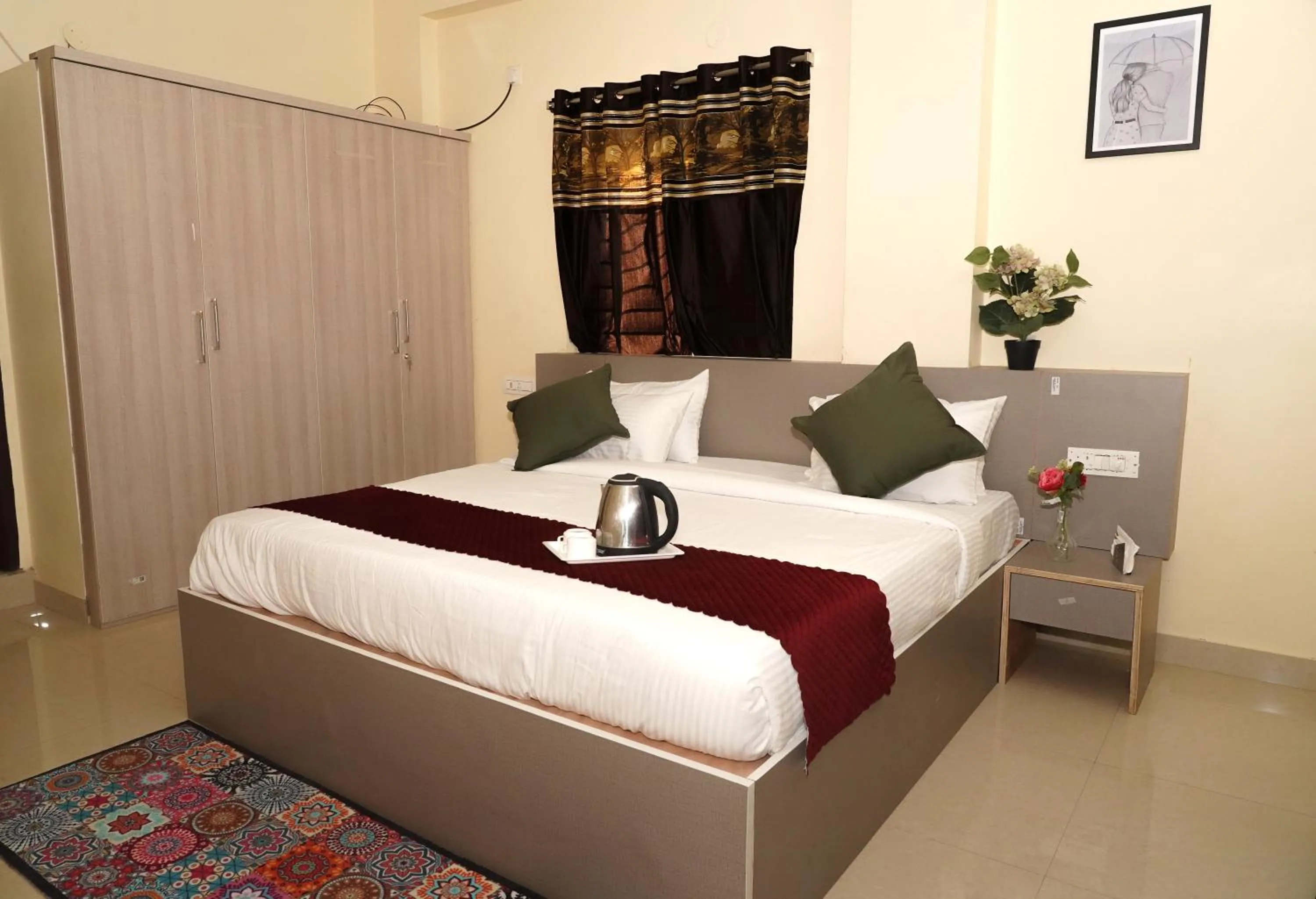 Bedroom in HOTEL ROYAL SUITES AND ROOMS Near AIG Hospital Gachibowli