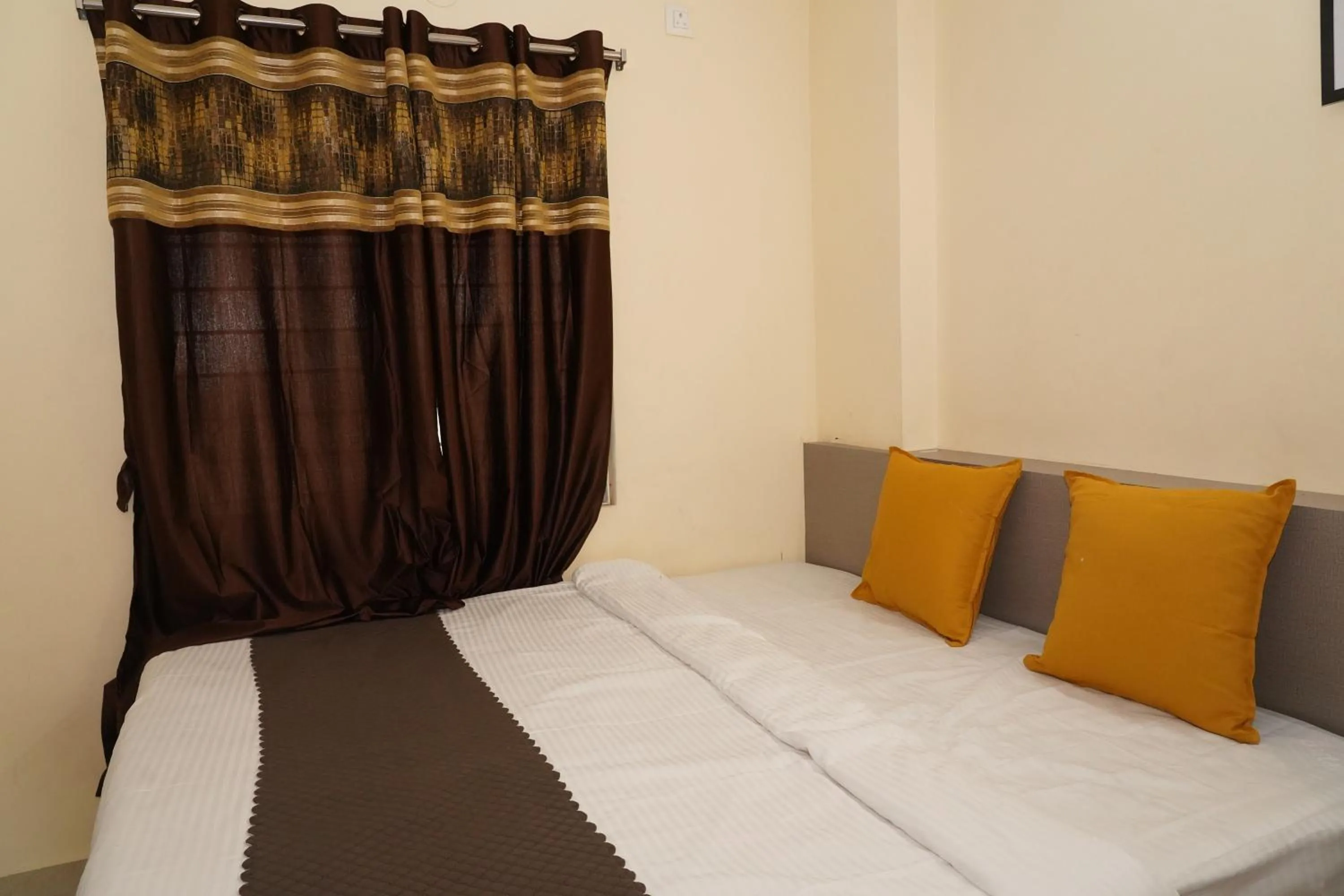 Bed in HOTEL ROYAL SUITES AND ROOMS Near AIG Hospital Gachibowli