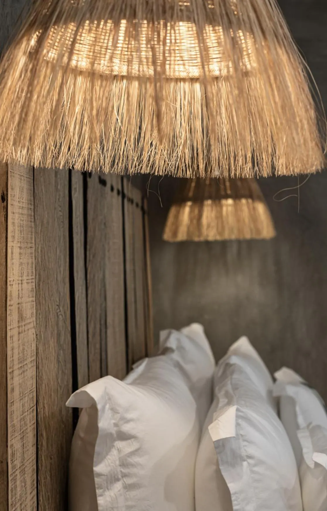 Bed in LalaGalu - Beachfront EcoCabins