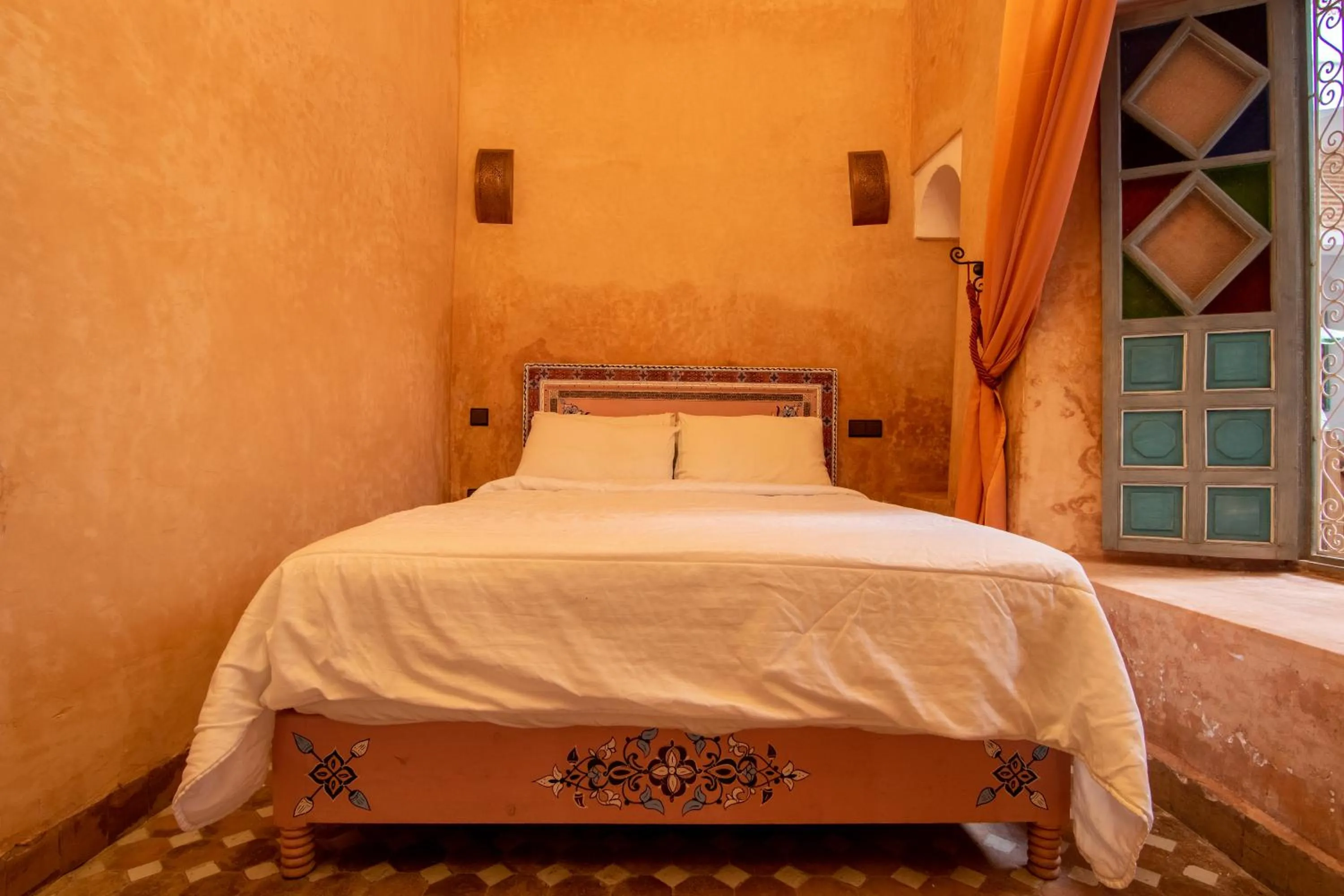 Bed in Riad Zinoun & Spa 11 Rooms
