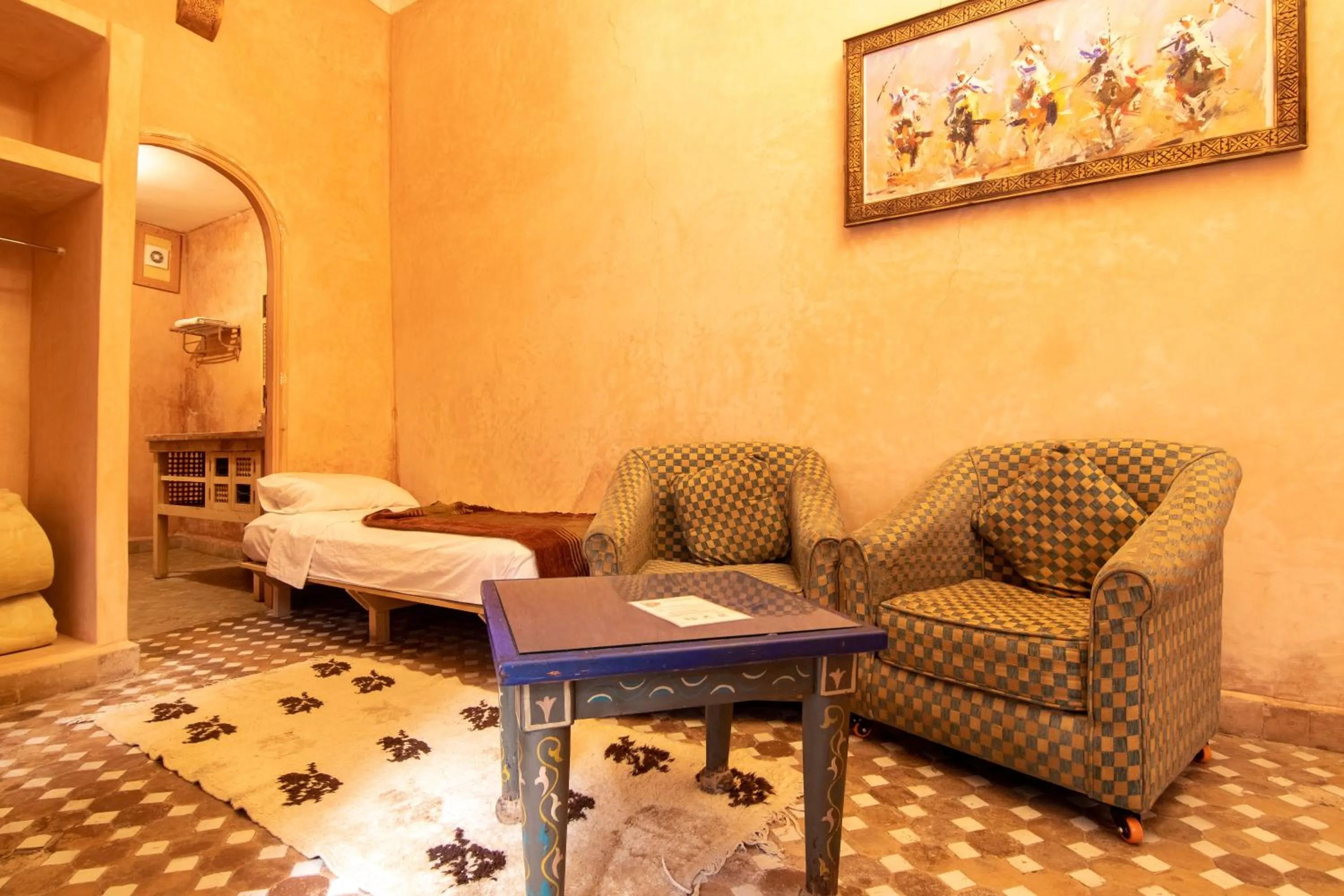 Living room, Bed in Riad Zinoun & Spa 11 Rooms