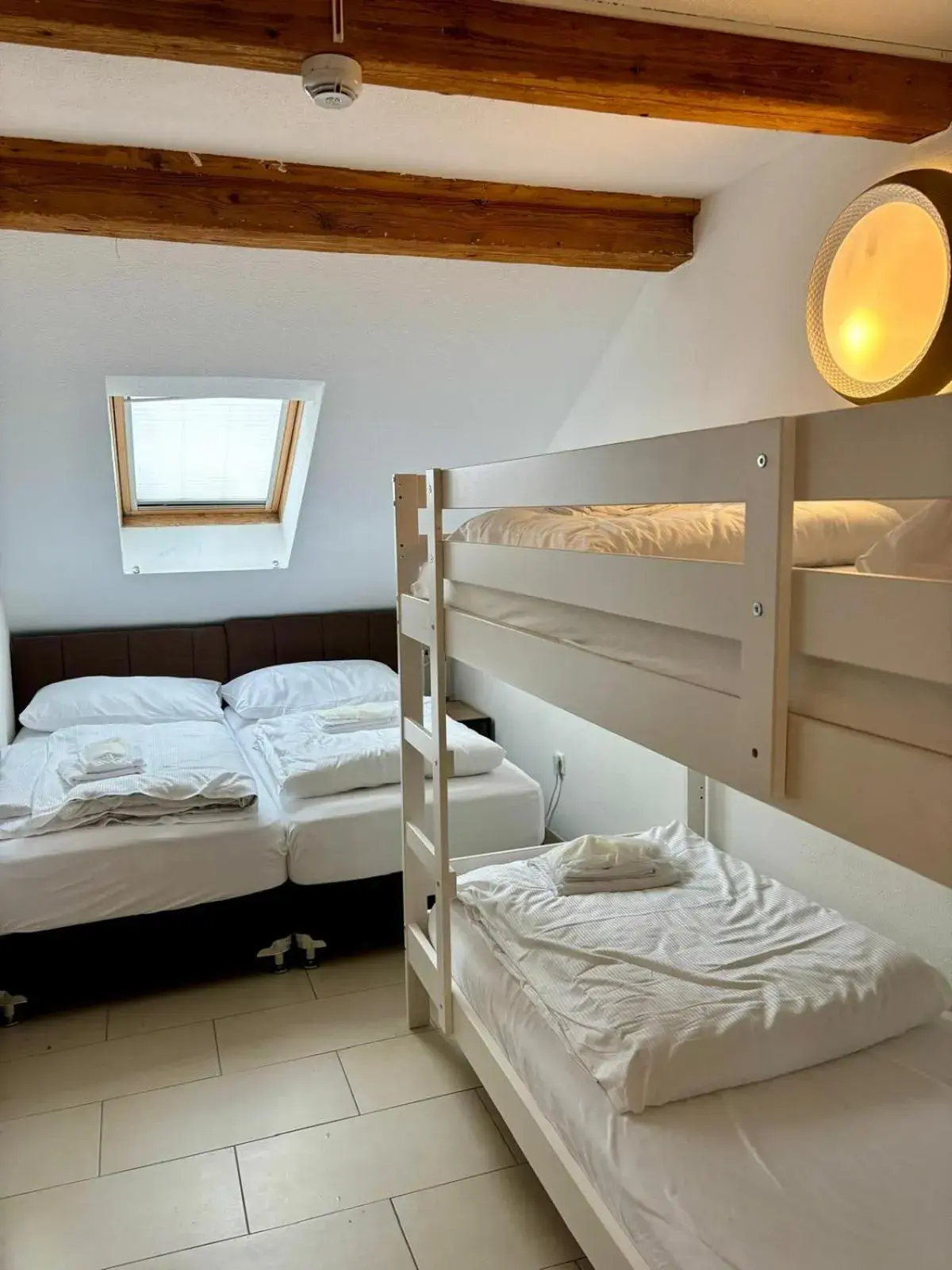 Quadruple Room with Shared Bathroom in Nani City Hotel Self Check-In Quadruple Room with Shared Bathroom in Nani City Hotel Self Check-In