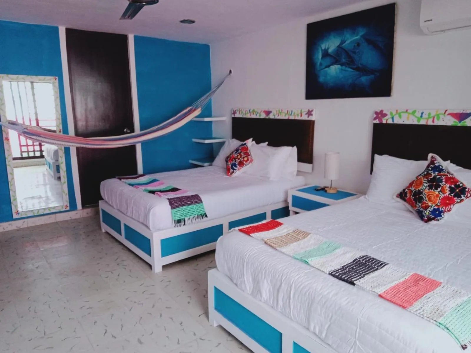 Bed in T´úubul K´iin Bed & Breakfast