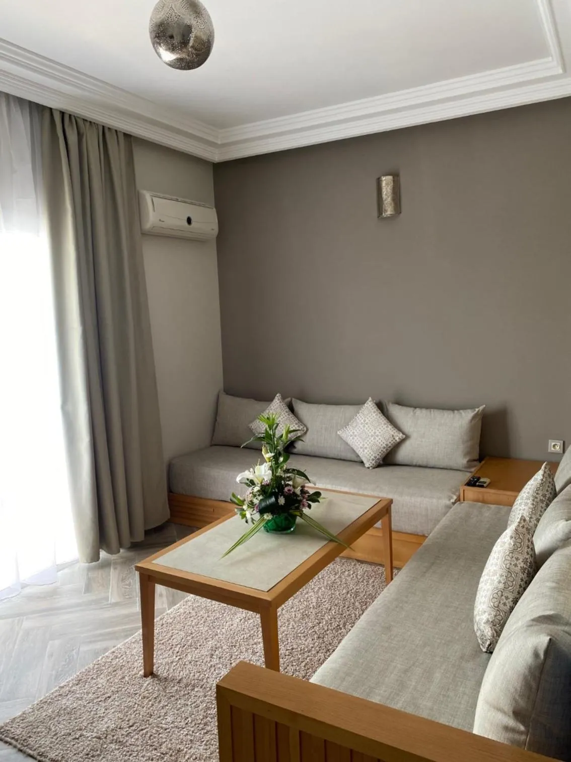 Living room, Bed in Golden Beach Appart'hotel