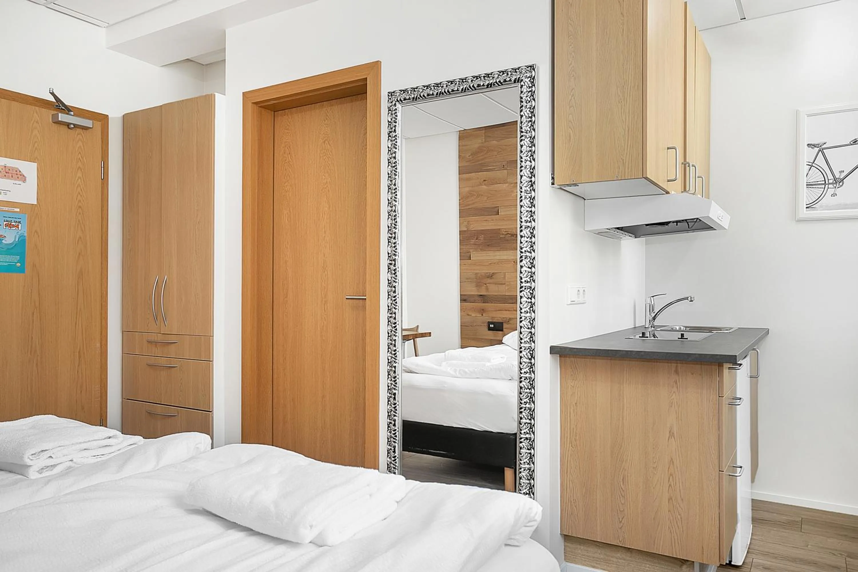 Kitchen or kitchenette, Bed in Stay Apartments Einholt