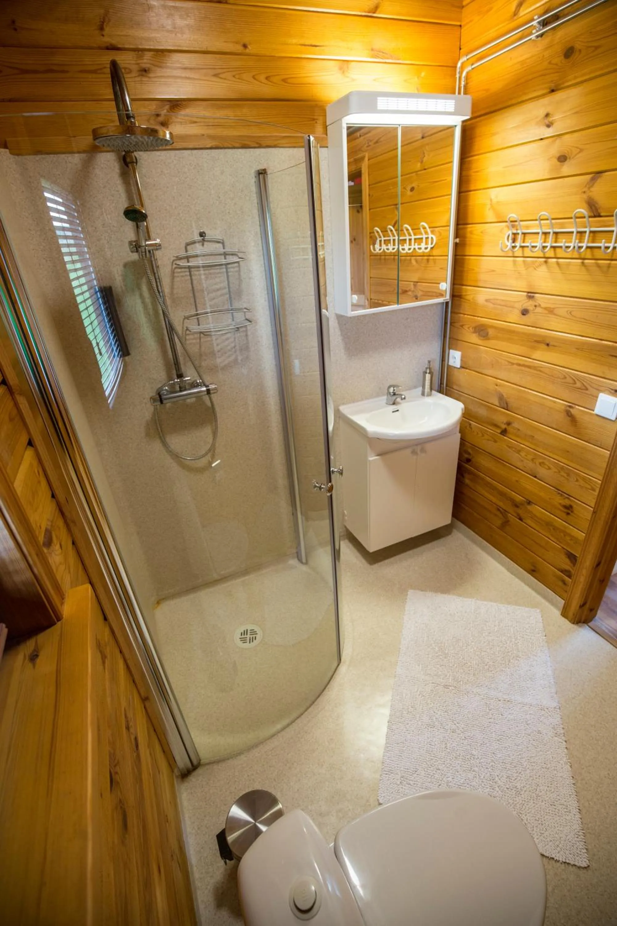 Shower in Hestasport Cottages