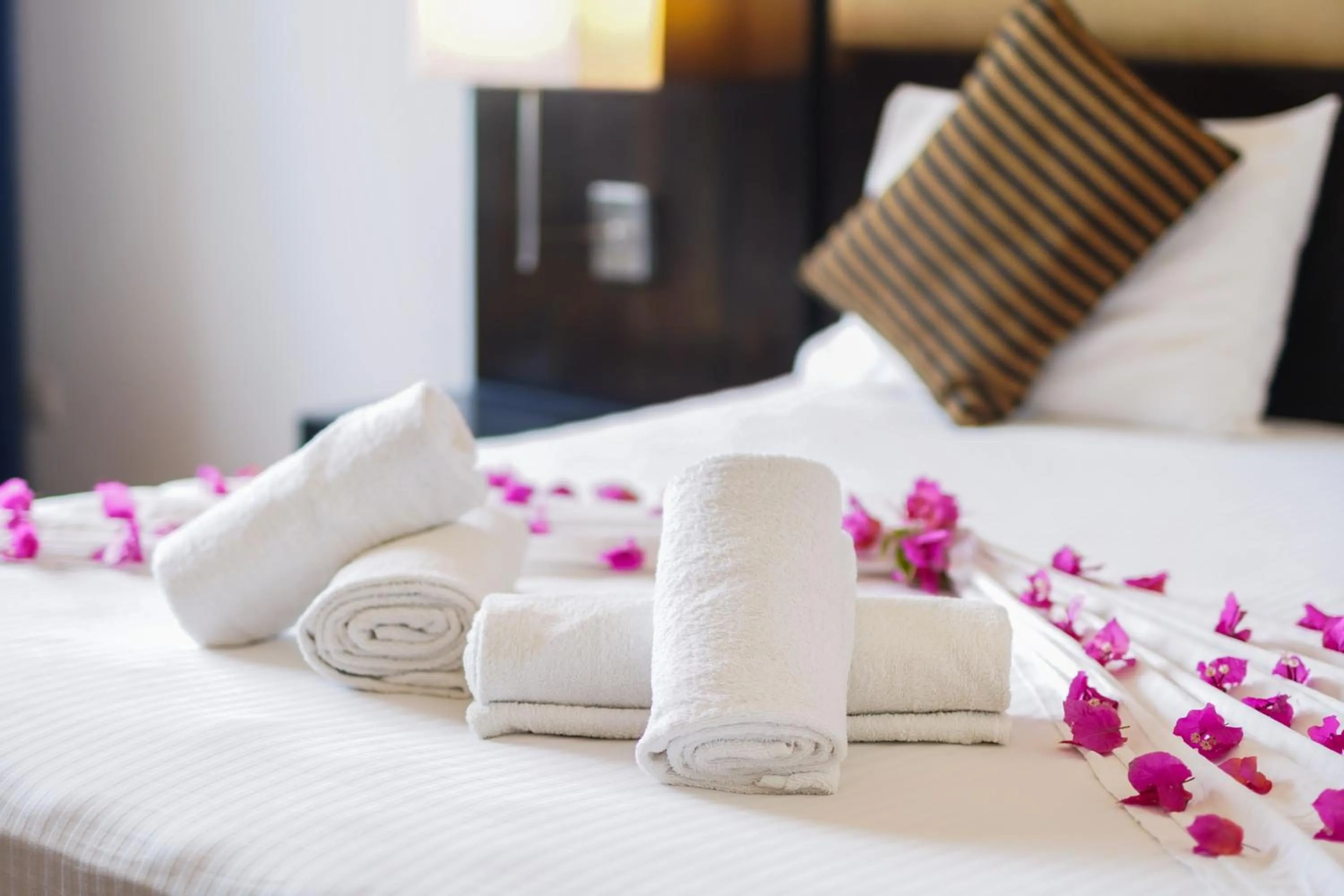 Bed in Peacock Beach Resort and Spa