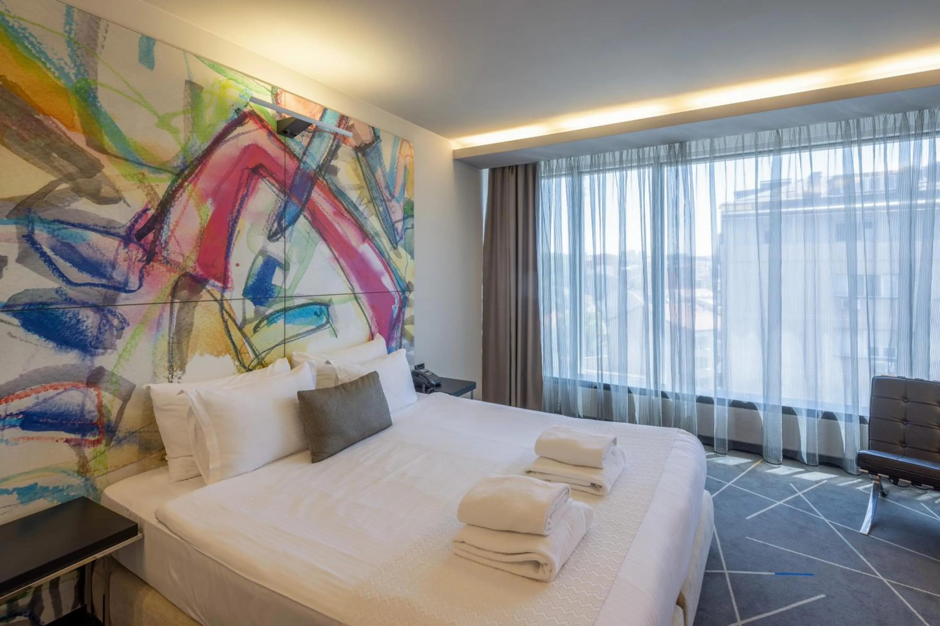 Bed in Nobel Zira Hotel