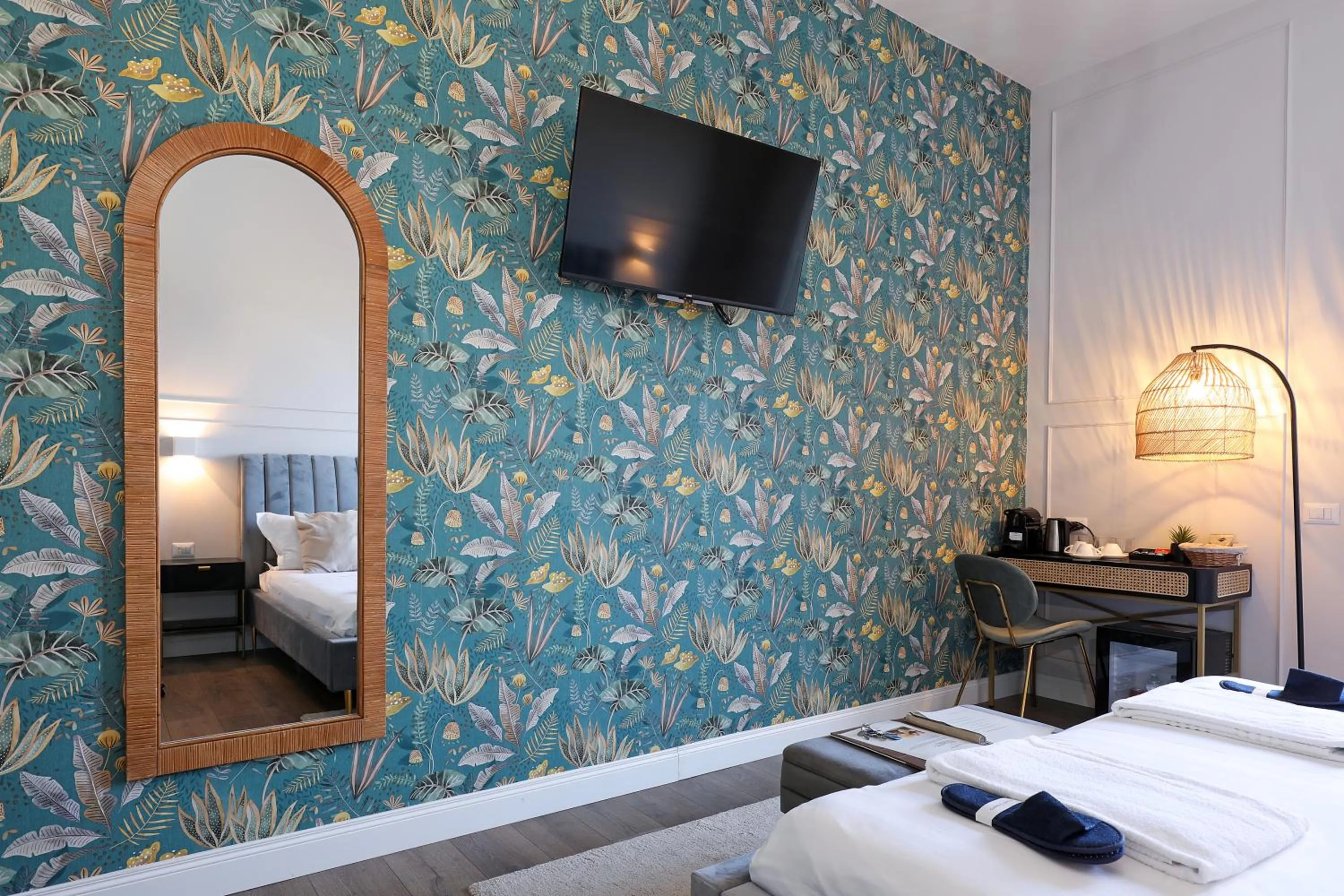 Bed in Rome Plaza Suites, Luxury Collection