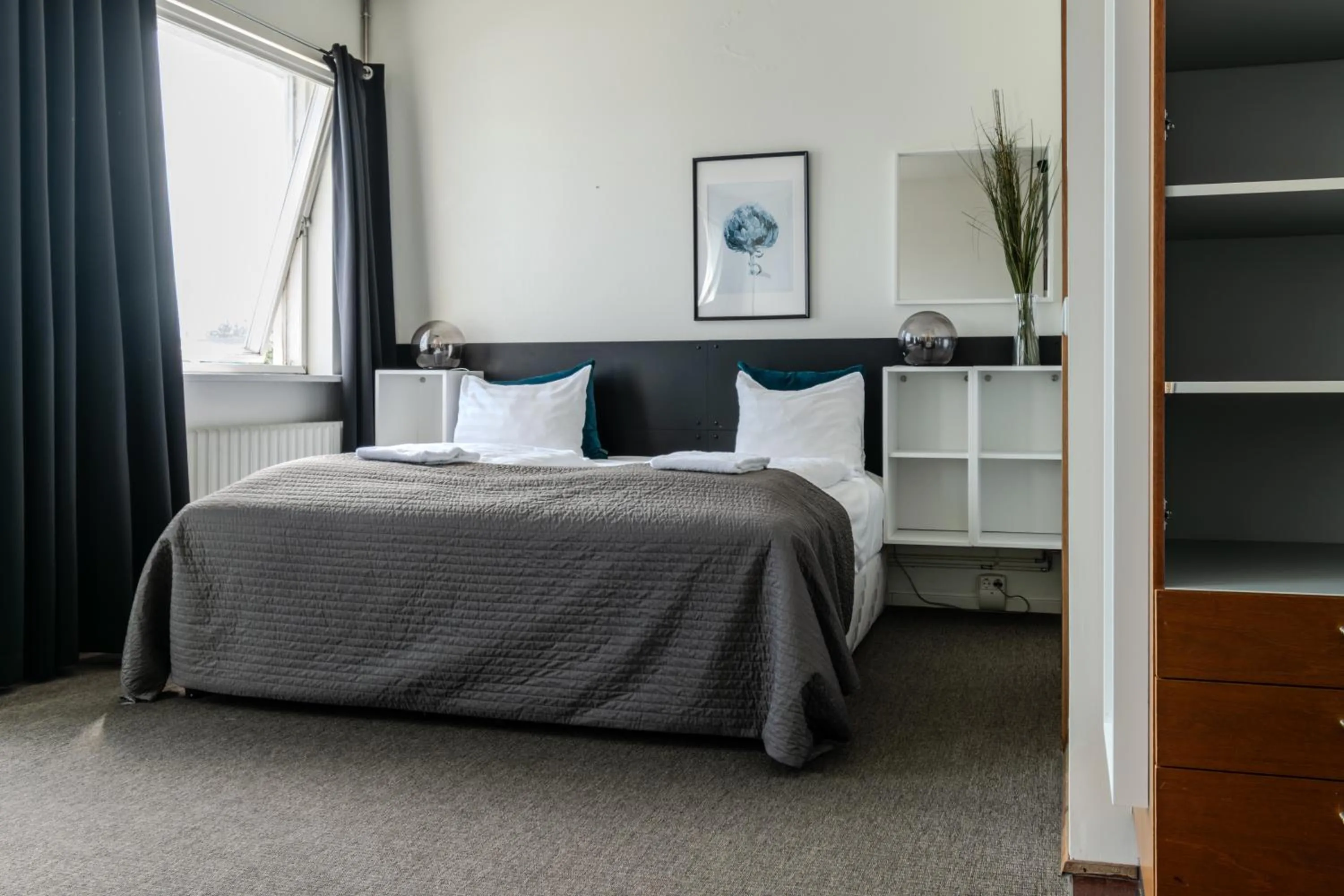 Bed in Máni Apartments