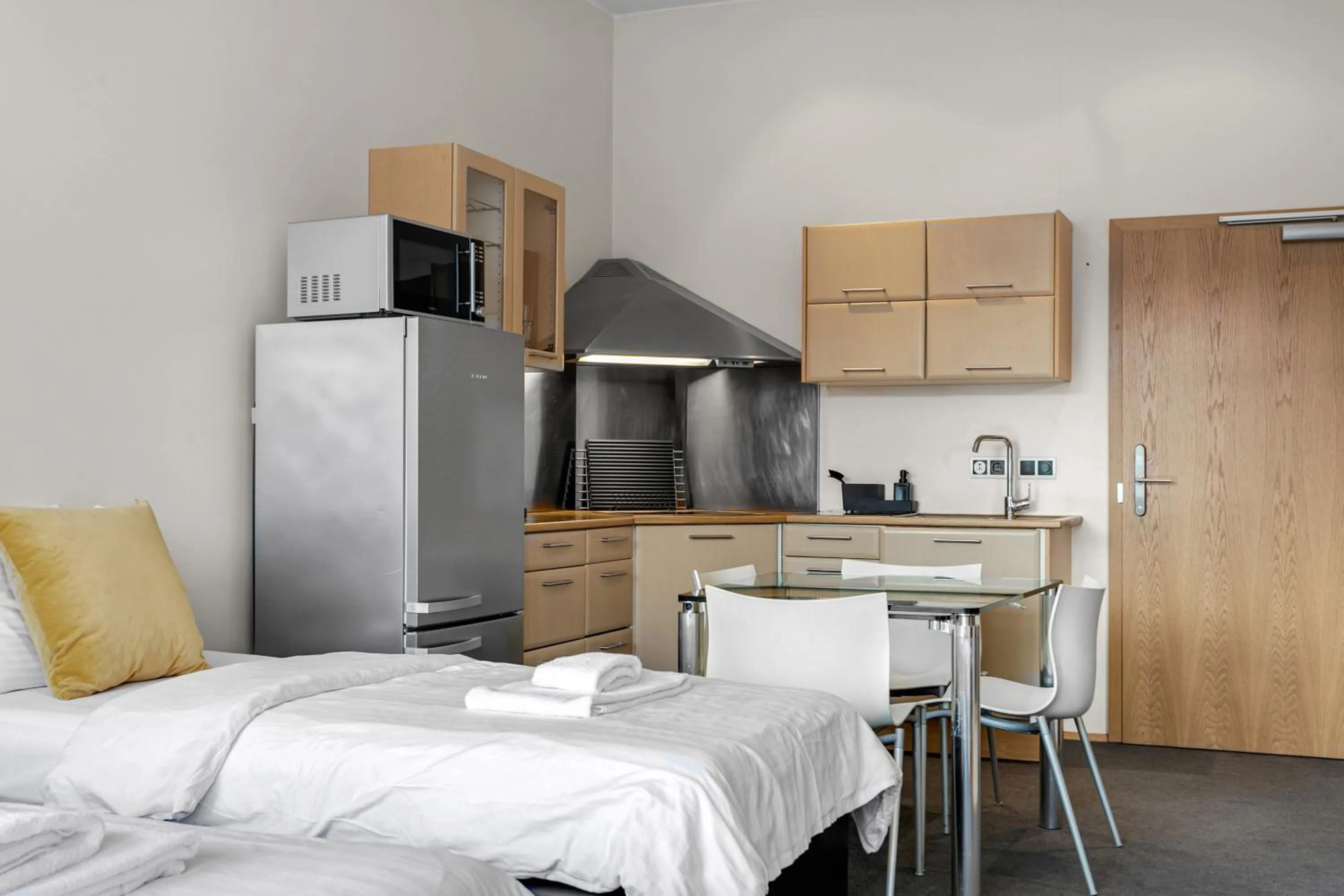 Bed in Máni Apartments