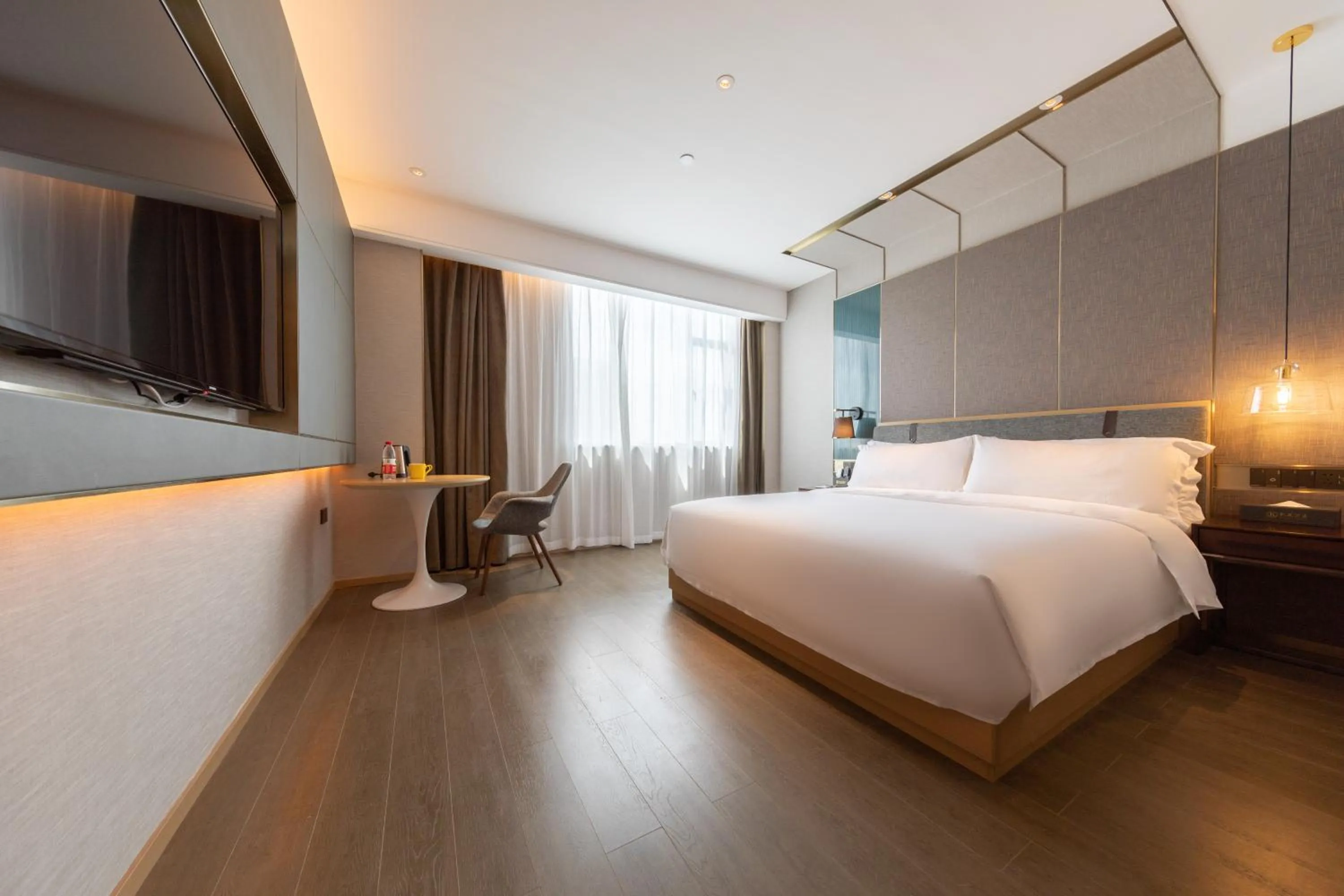 Photo of the whole room, Bed in Paco Hotel Guangzhou South Railway Station Panyu Changlong Branch