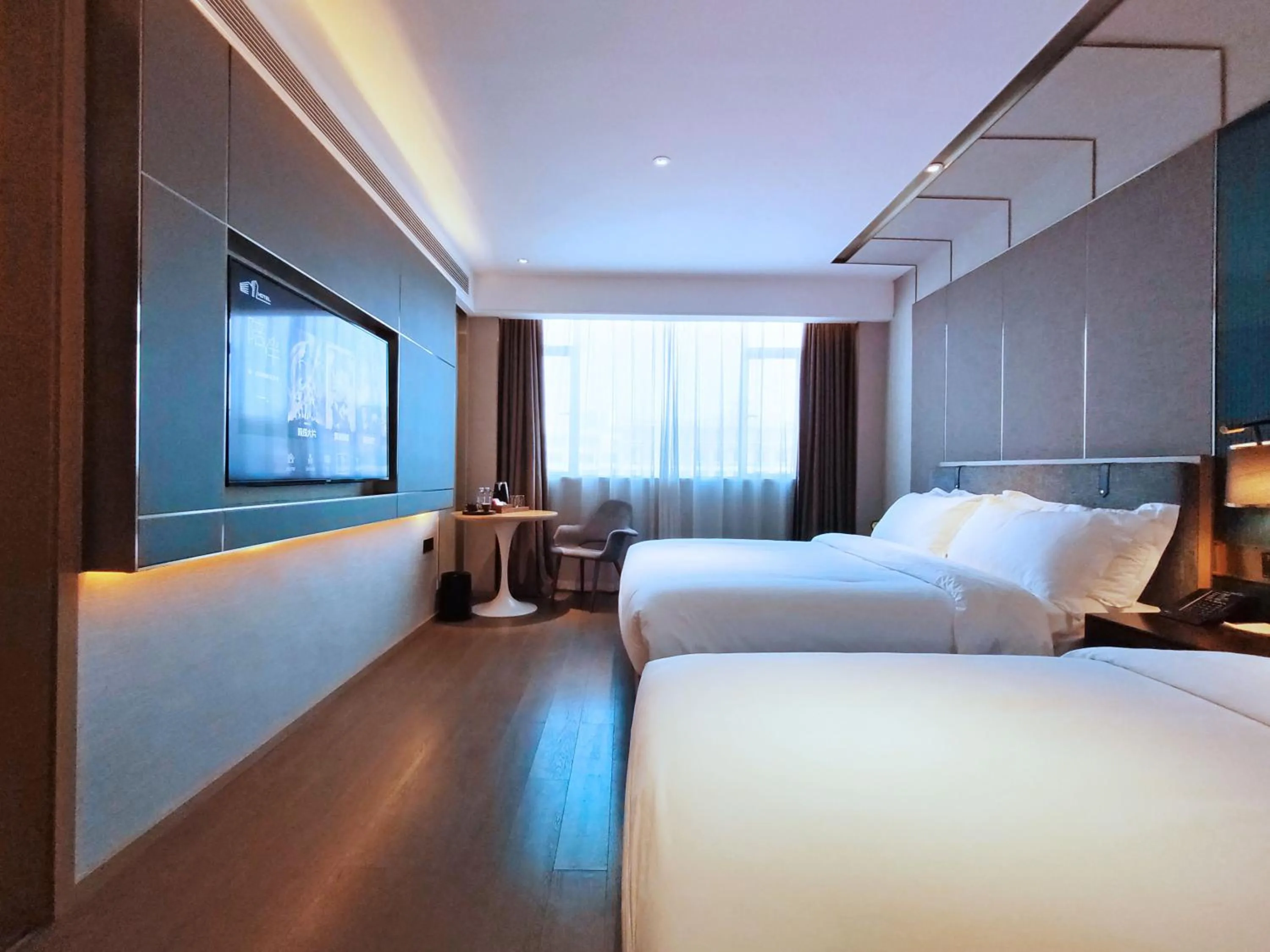 Photo of the whole room, Bed in Paco Hotel Guangzhou South Railway Station Panyu Changlong Branch