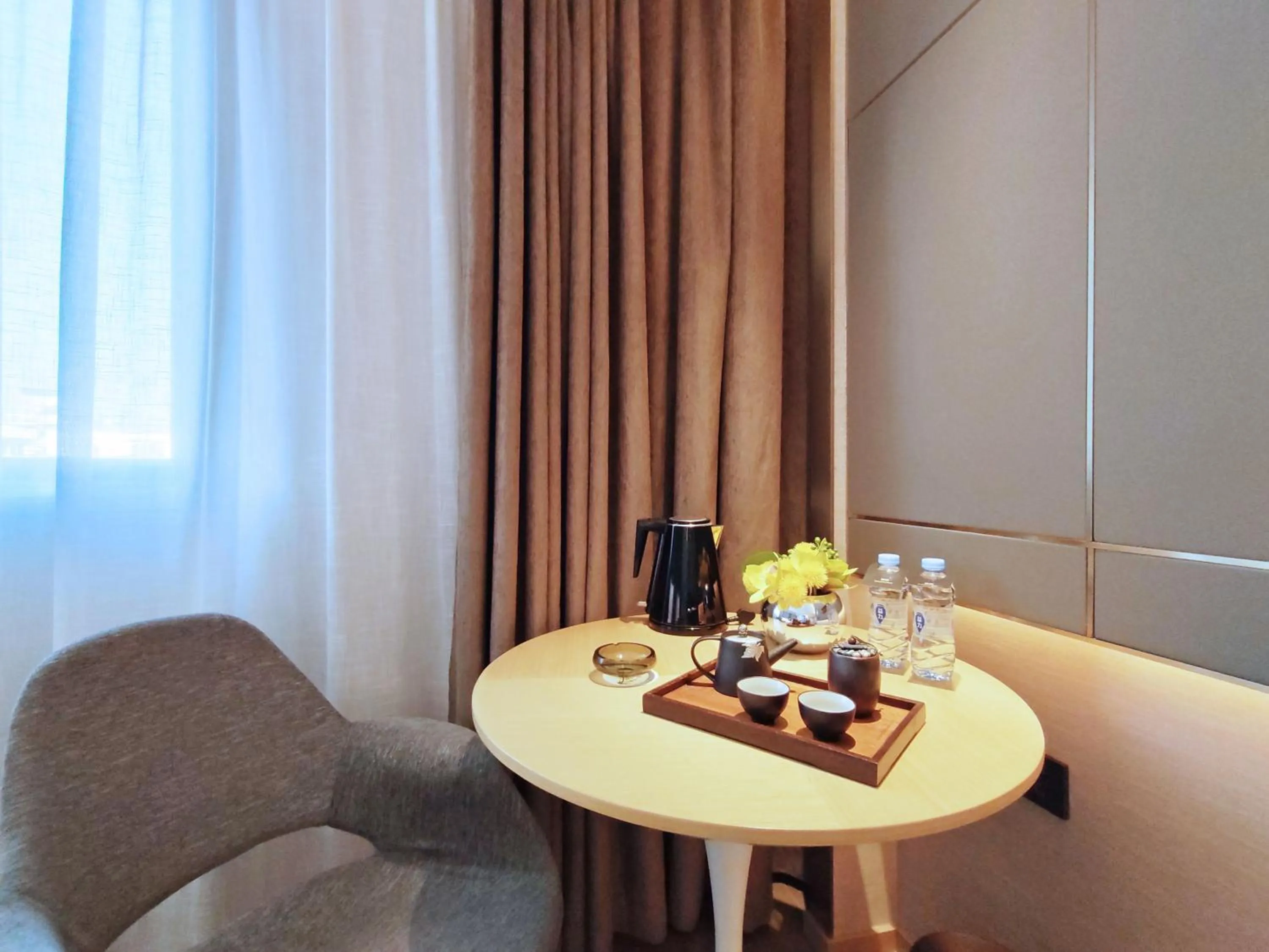 Living room in Paco Hotel Guangzhou South Railway Station Panyu Changlong Branch