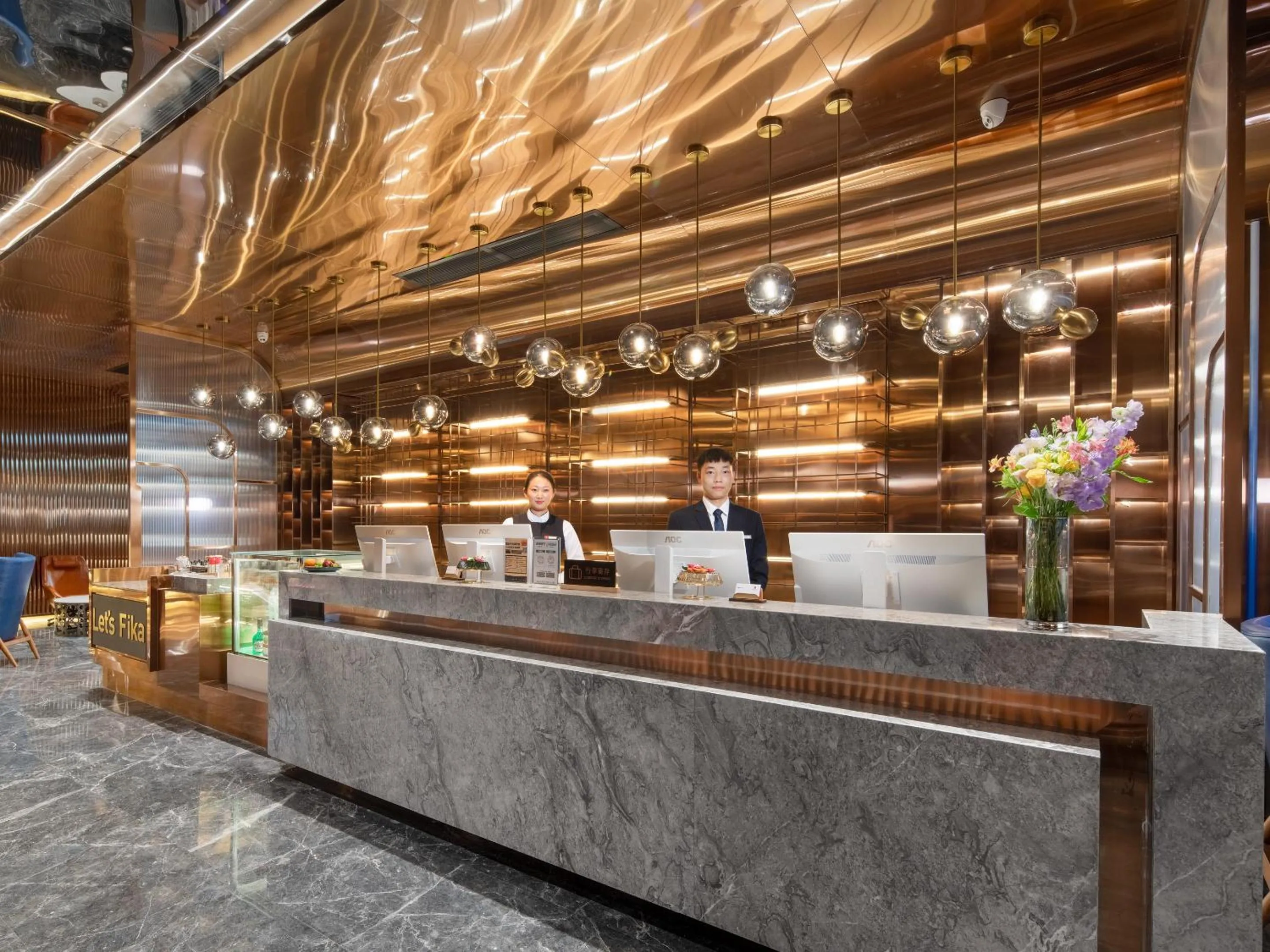 Lobby or reception in Echarm PLUS International Hotel Zhujiang New Town Wuyangcun Metro Station Branch- Free Deliver Service to Canton Fair Complex During Canton Fair Period