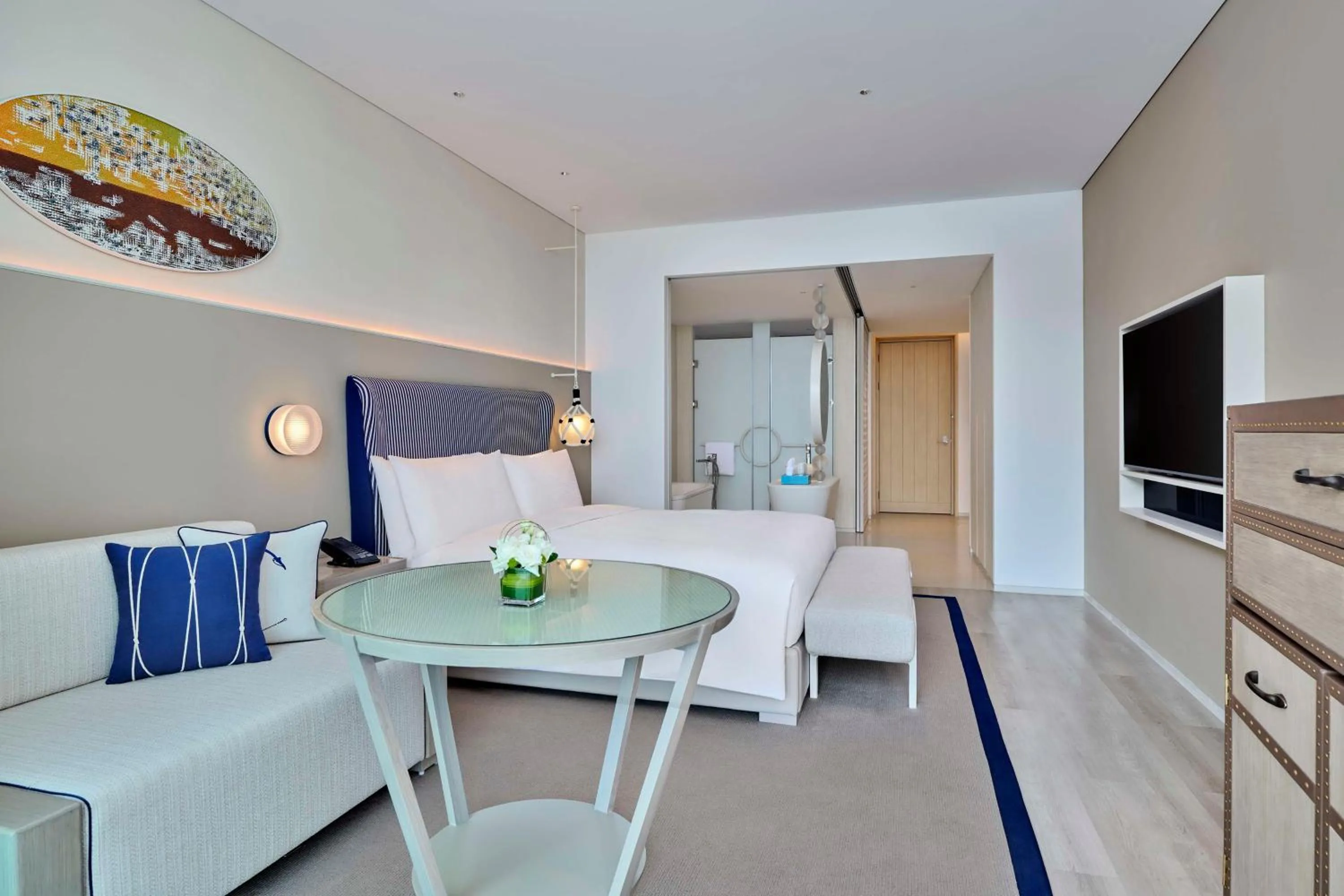 Living room in The Mermoon Resort Hainan Tufu Bay, Tapestry By Hilton