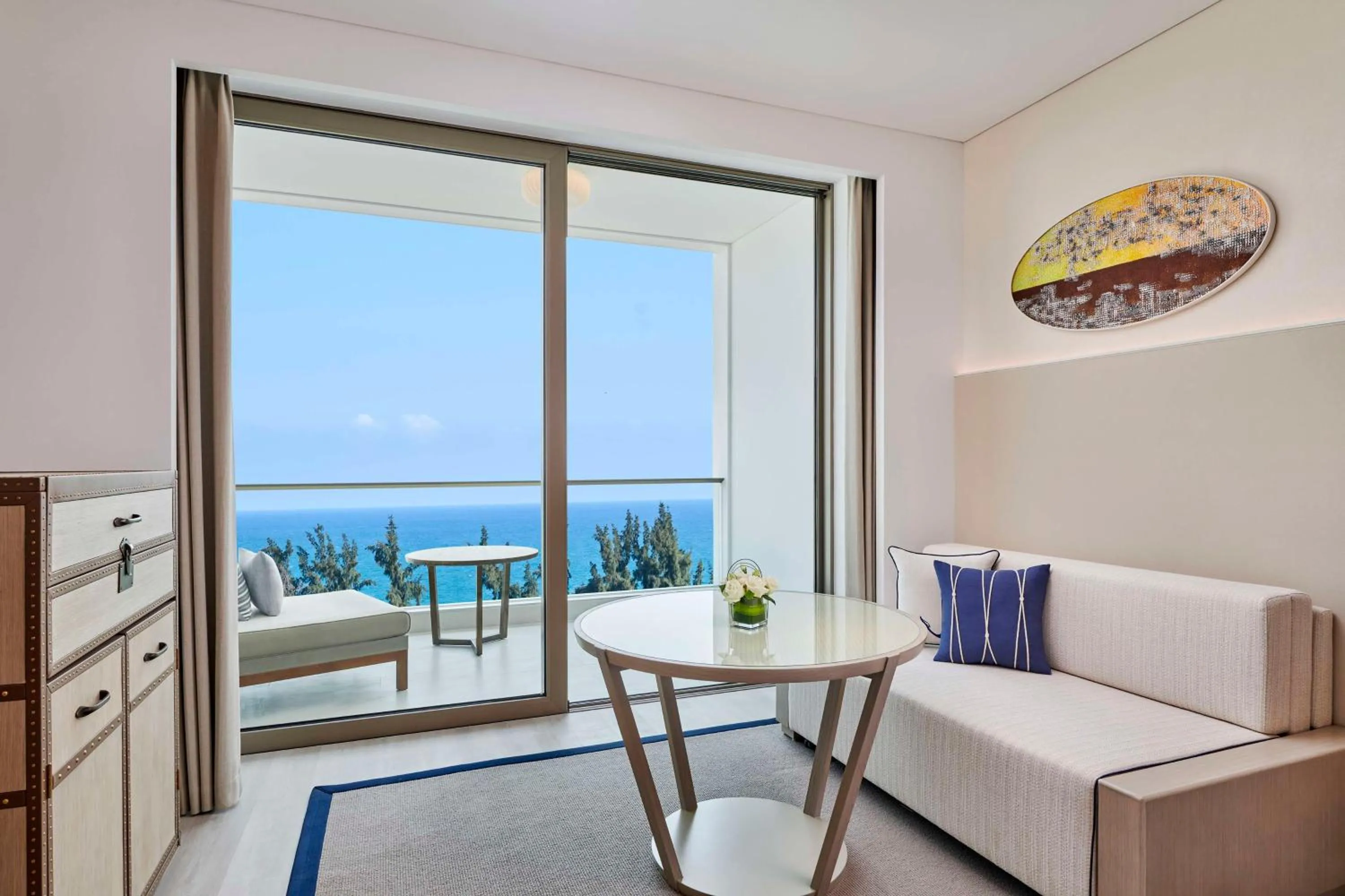 Living room in The Mermoon Resort Hainan Tufu Bay, Tapestry By Hilton