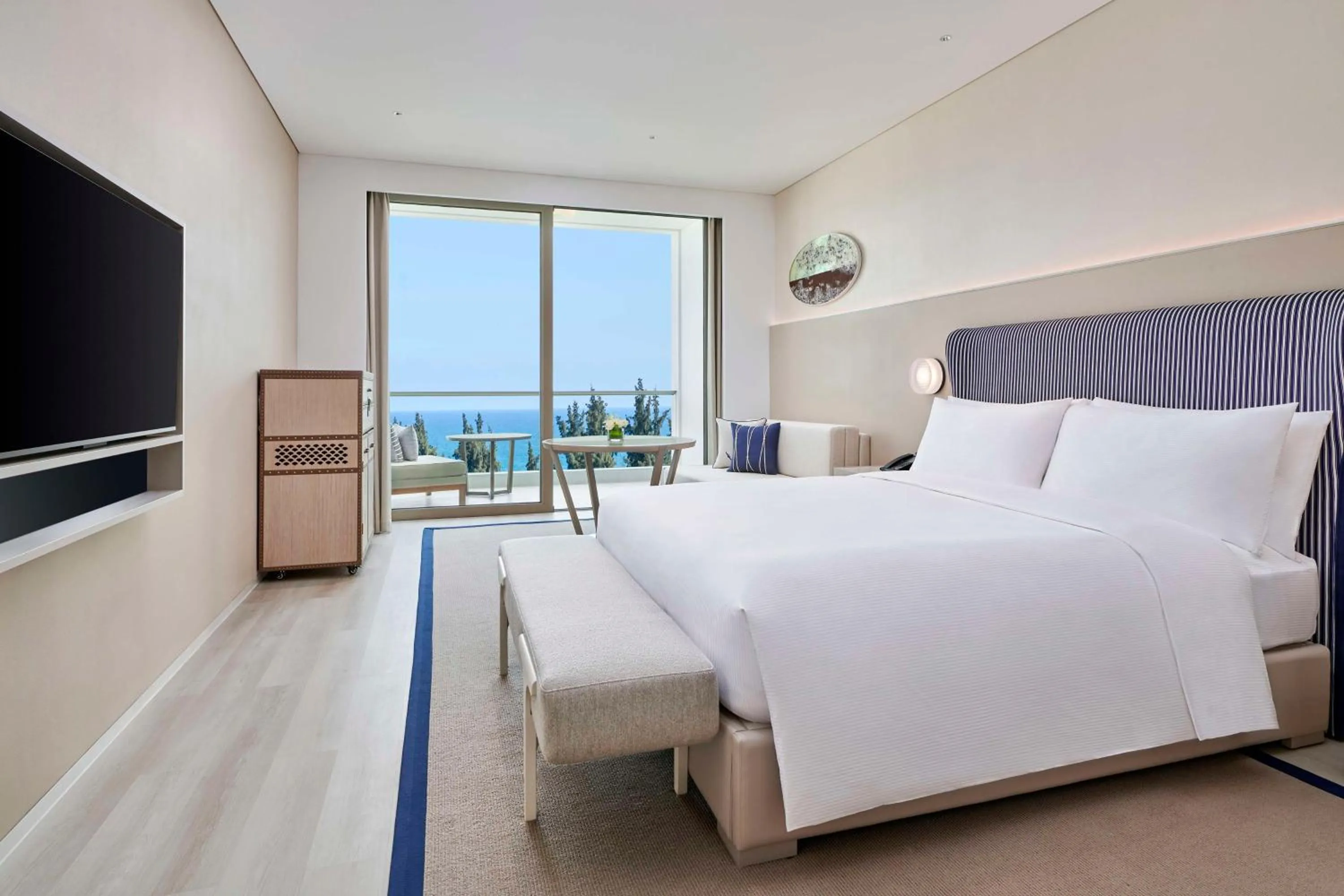 Bed in The Mermoon Resort Hainan Tufu Bay, Tapestry By Hilton