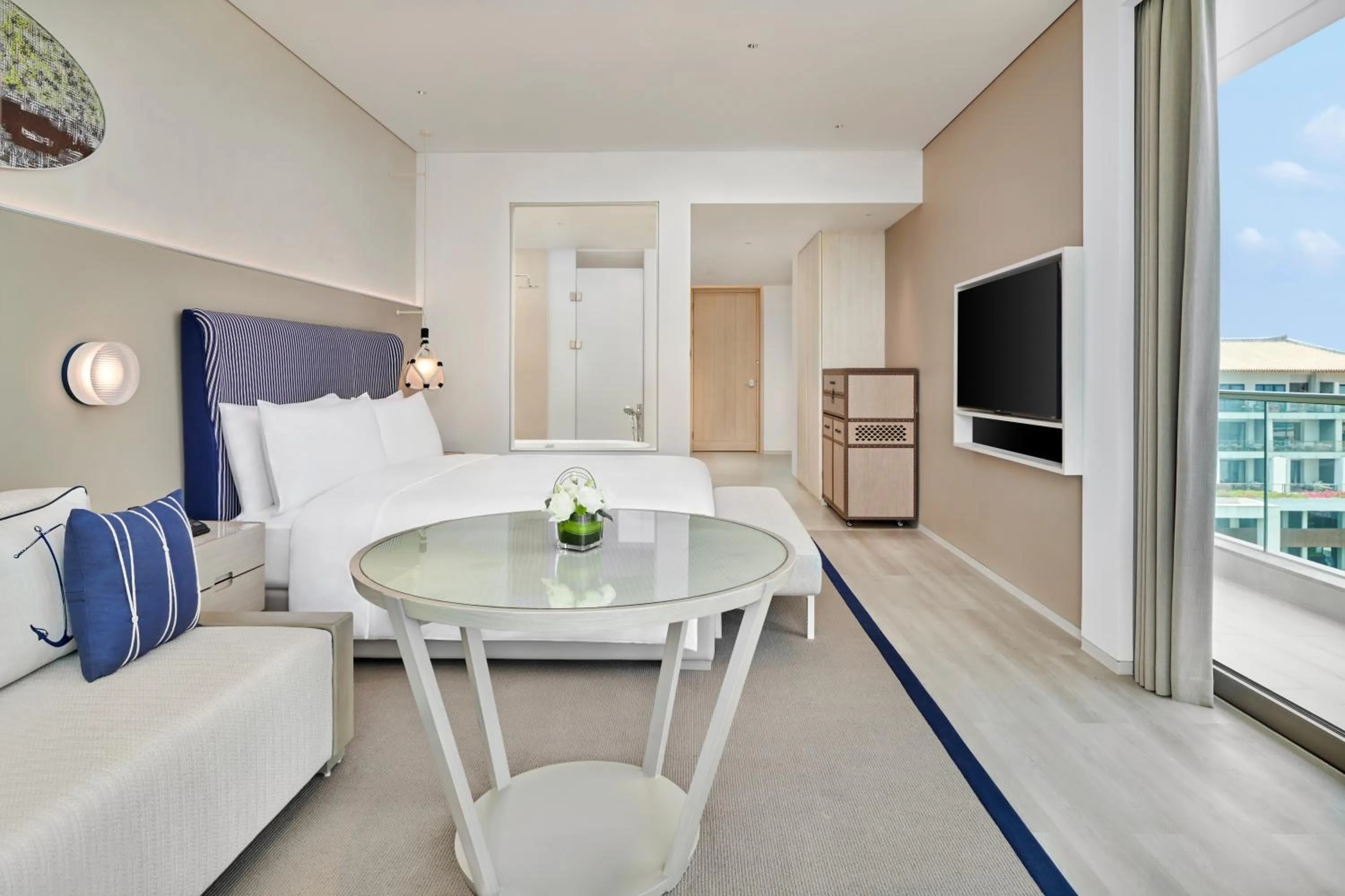 Photo of the whole room in The Mermoon Resort Hainan Tufu Bay, Tapestry By Hilton