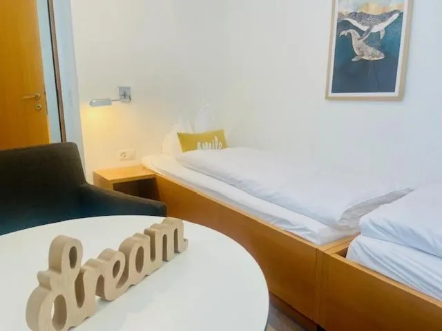 Bed in Hotel Schatzmann