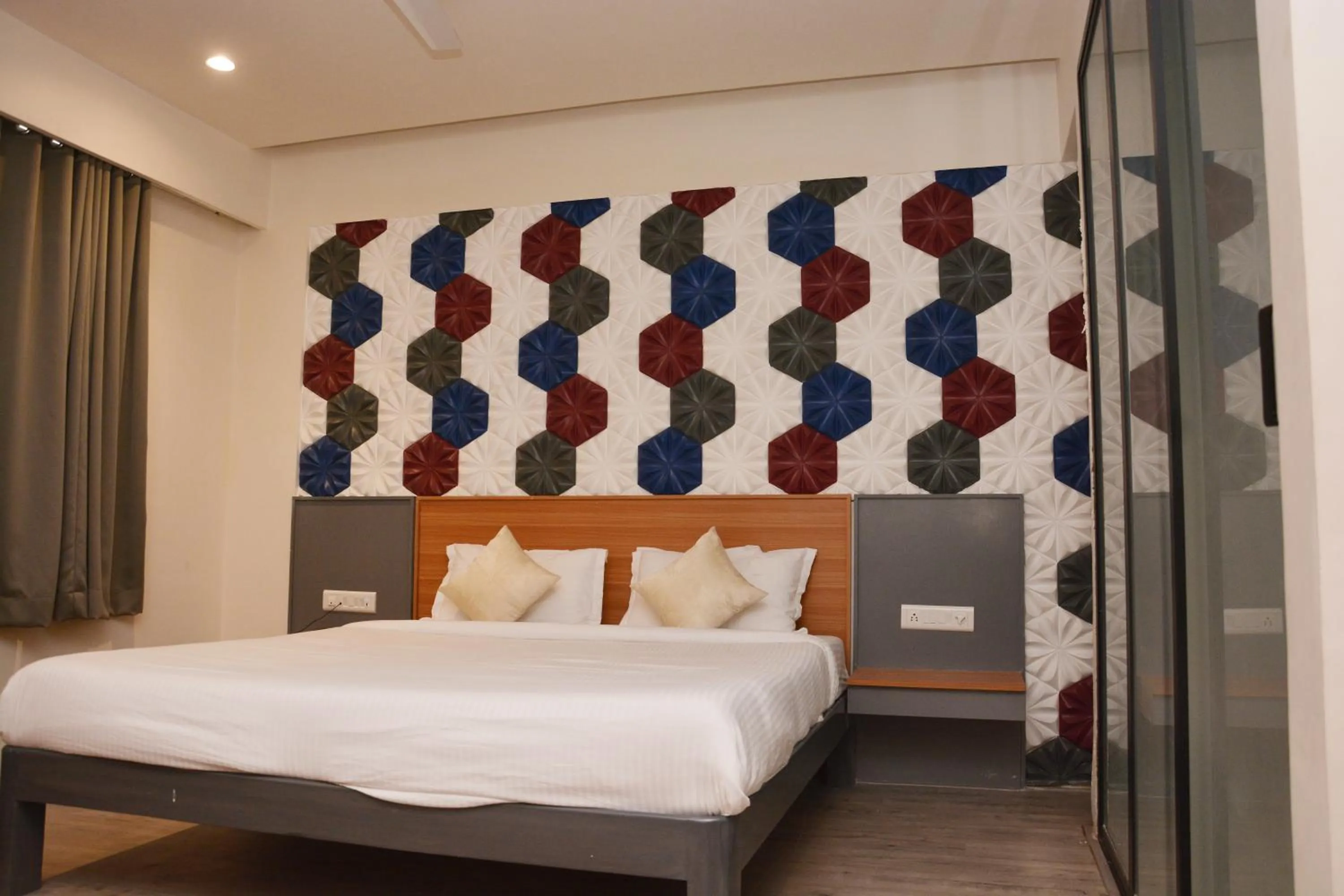 Bed in Hotel Sai Palkhi Niwara