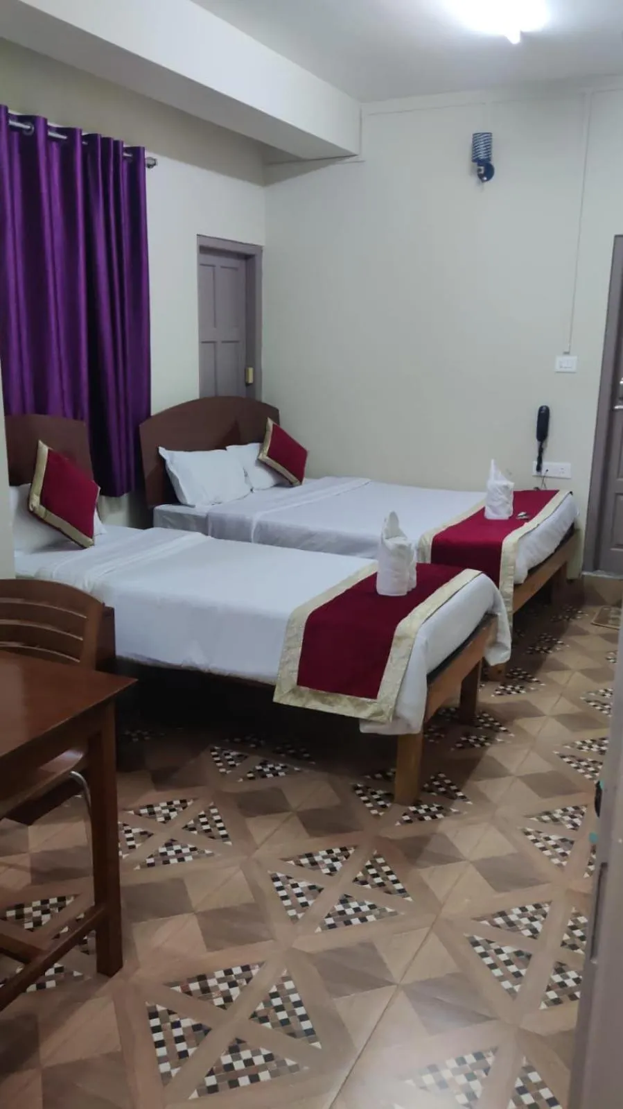 Bed in Magvaris Comfort Inn