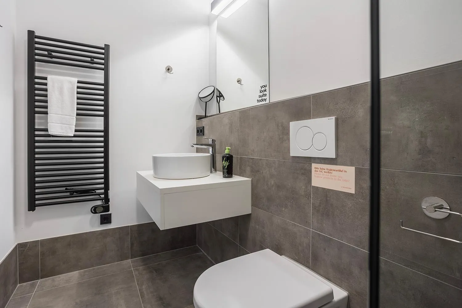 Bathroom in Limehome Villach Hauptplatz
