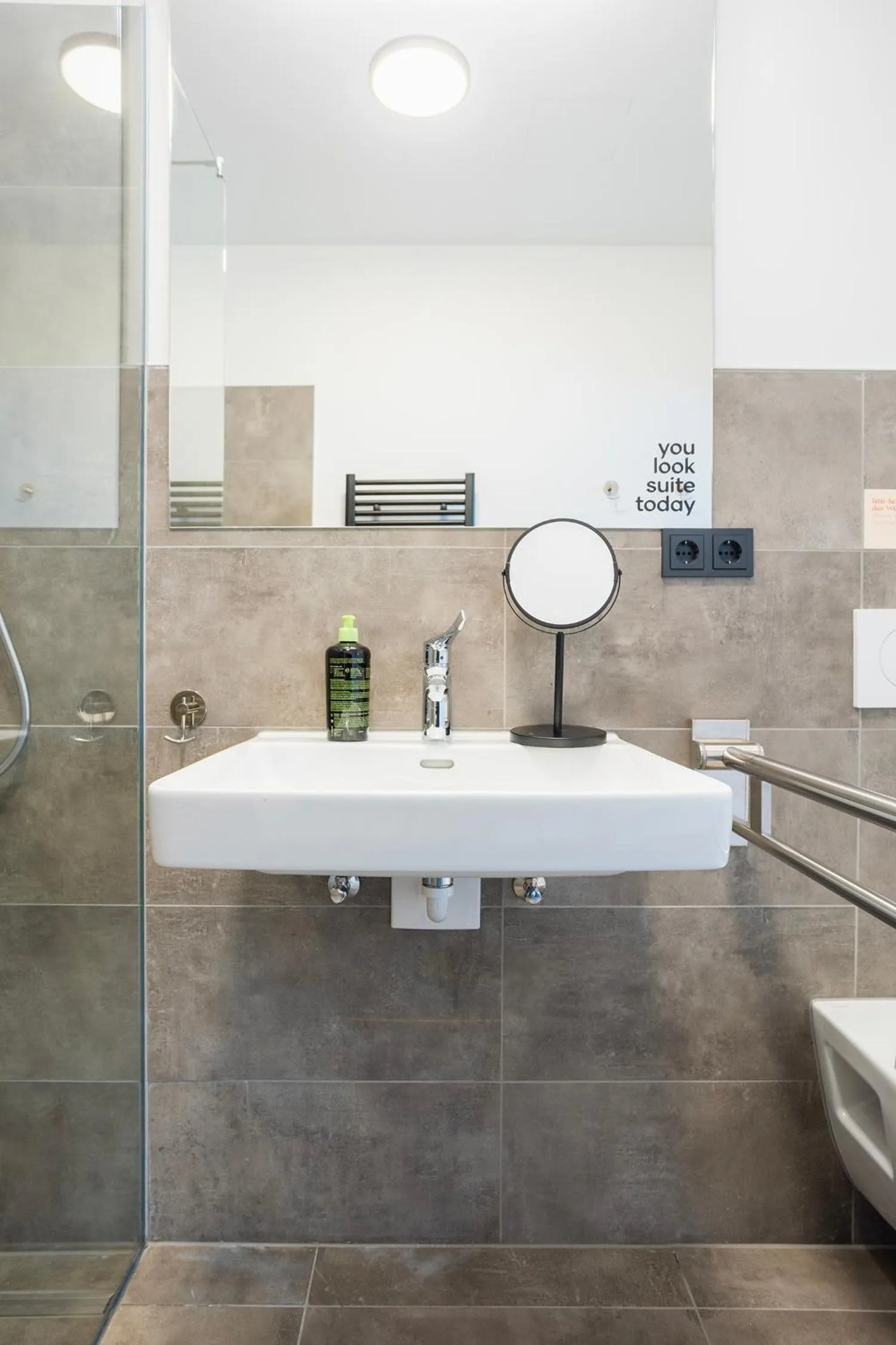 Bathroom in Limehome Villach Hauptplatz