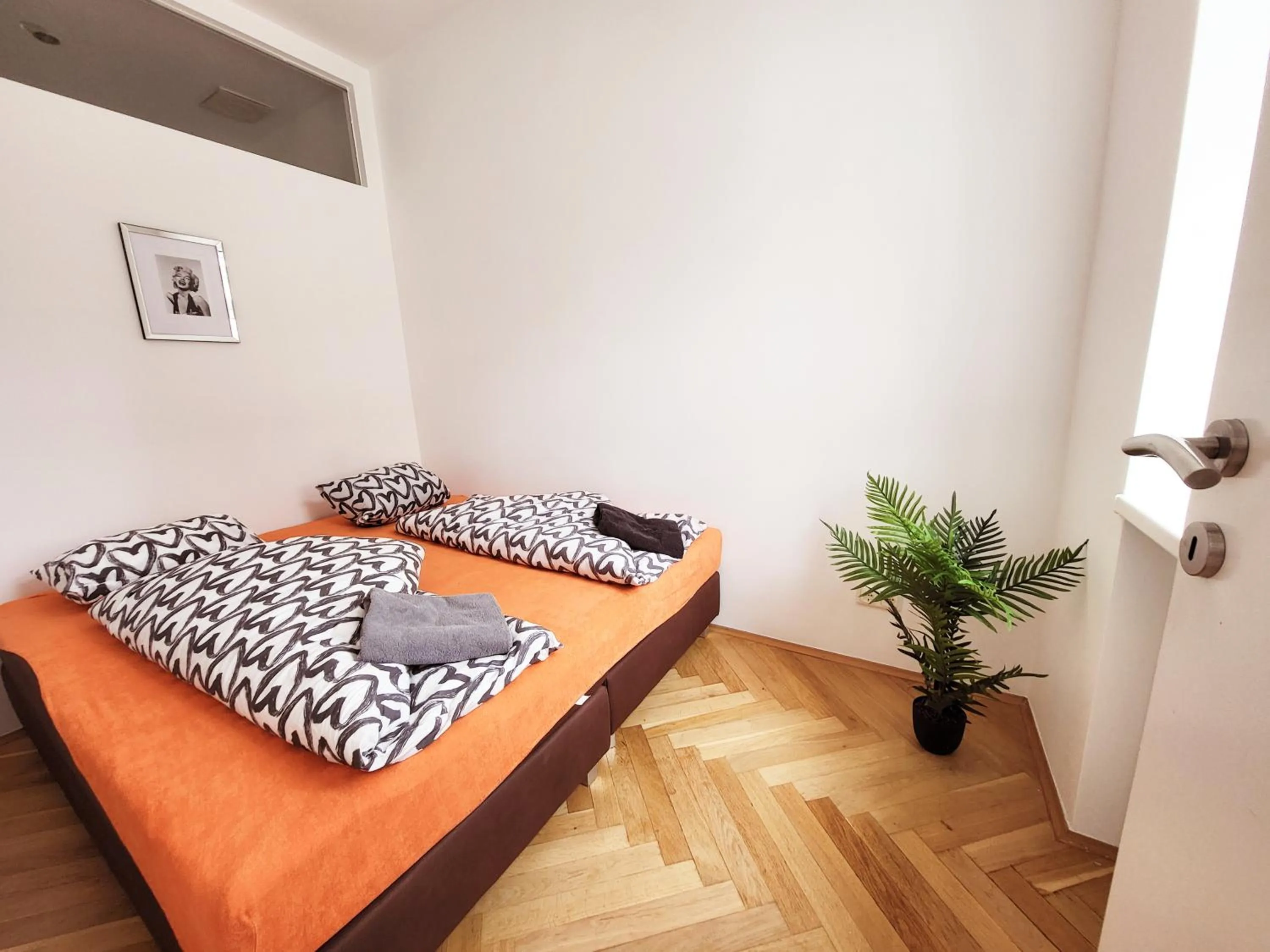 Bed in Donaufelder City Apartment