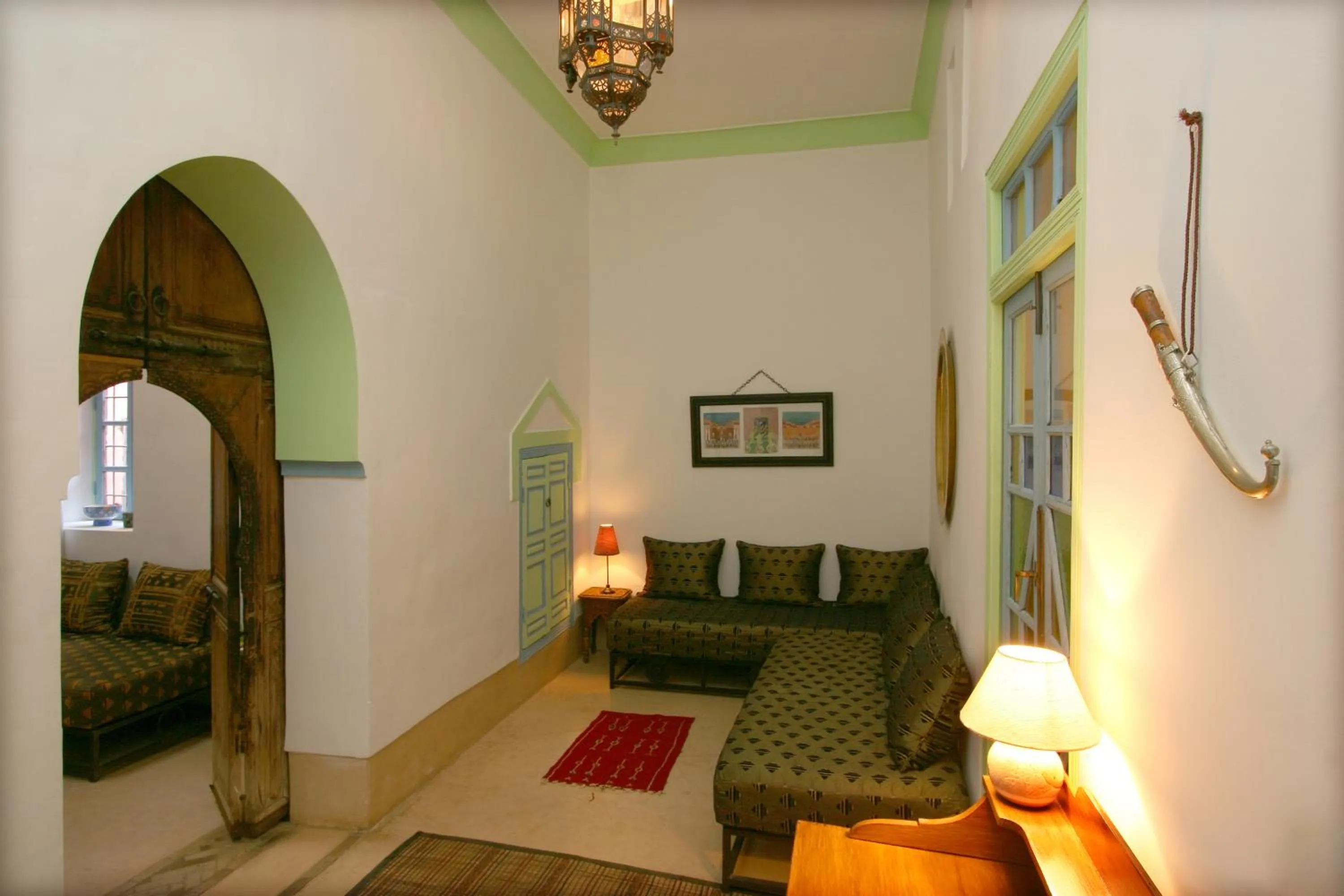 Seating area, Bed in Riad Karmela