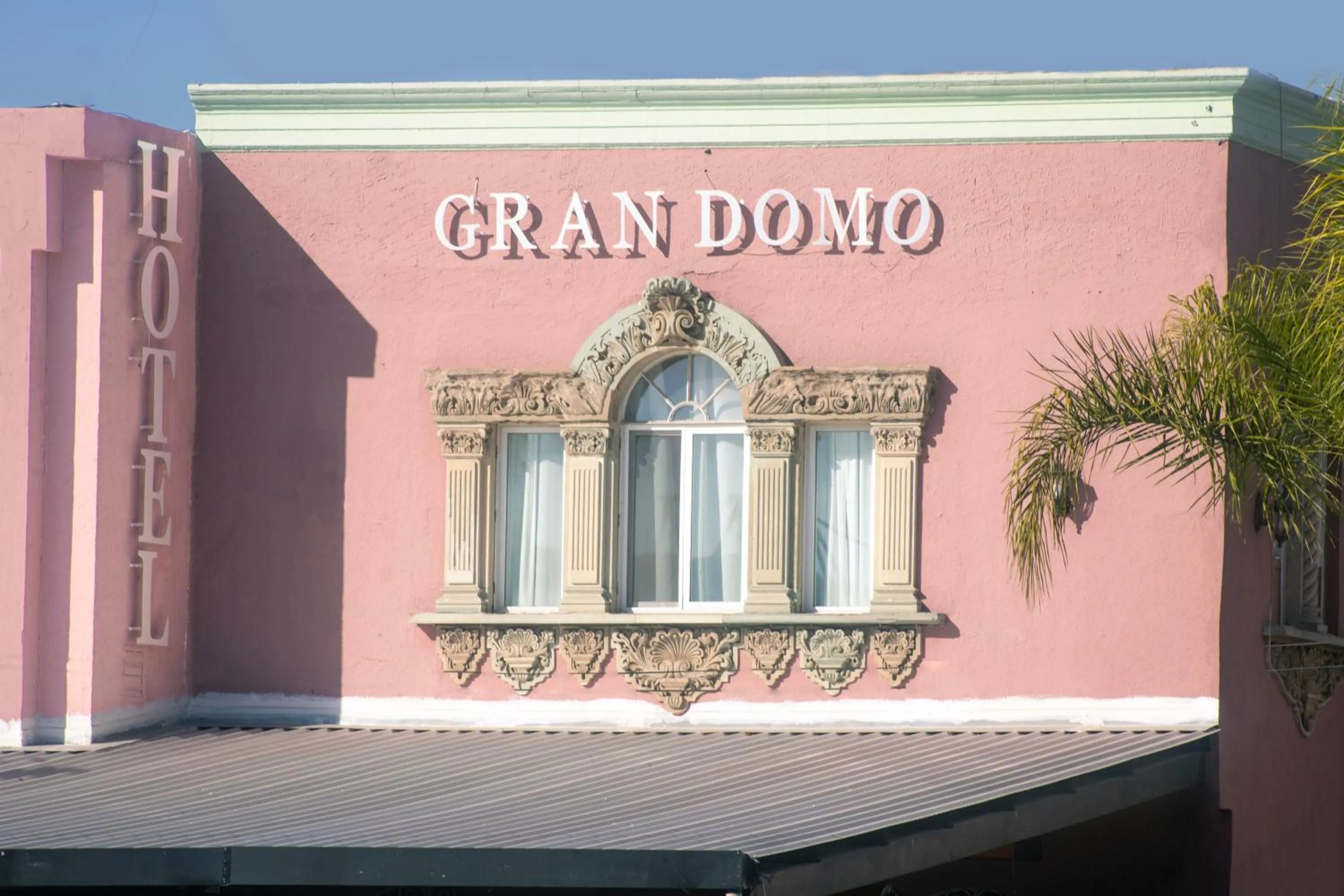 Property logo or sign in Hotel Gran Domo