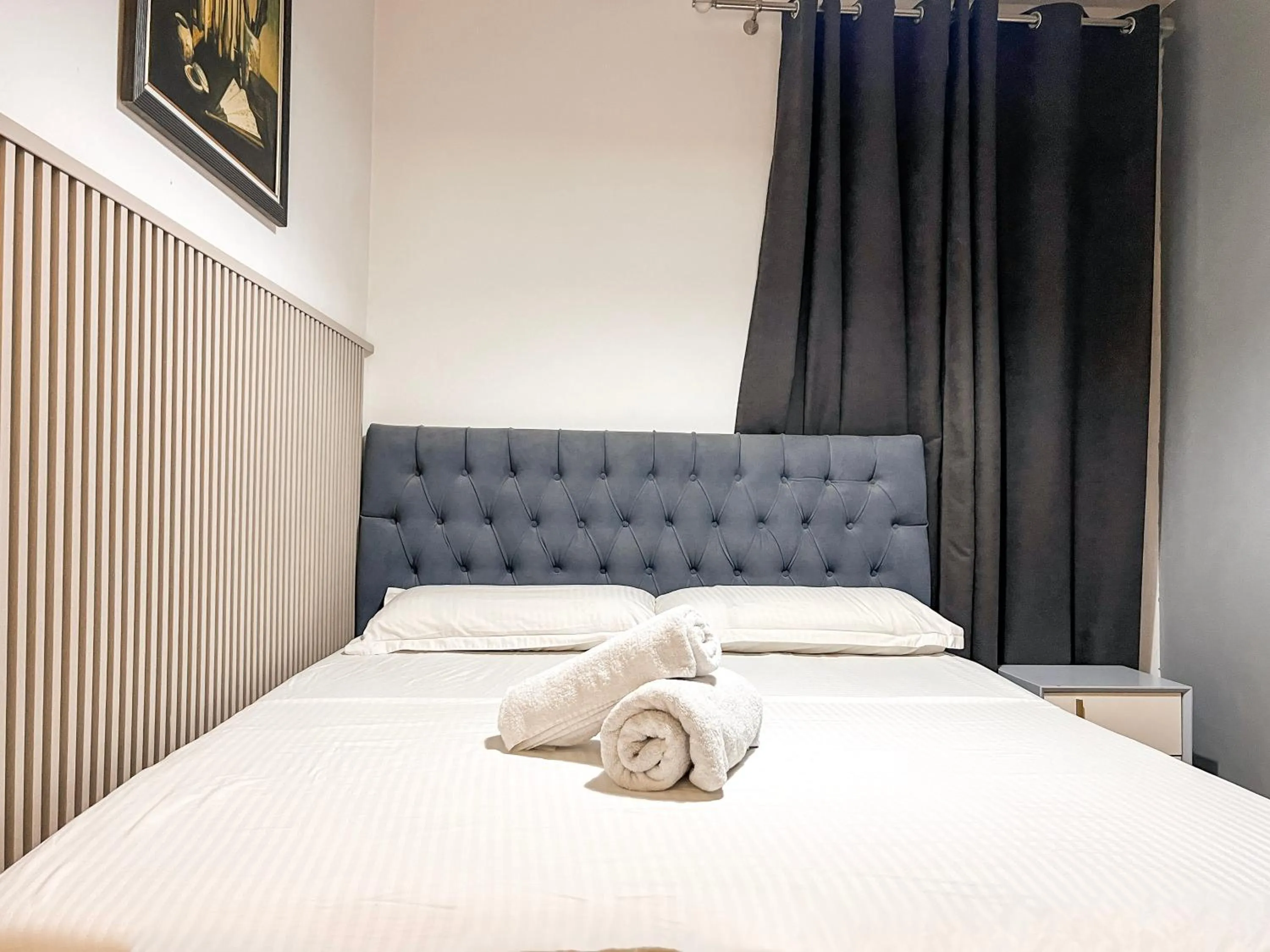 Bed in Hotel Tier Center