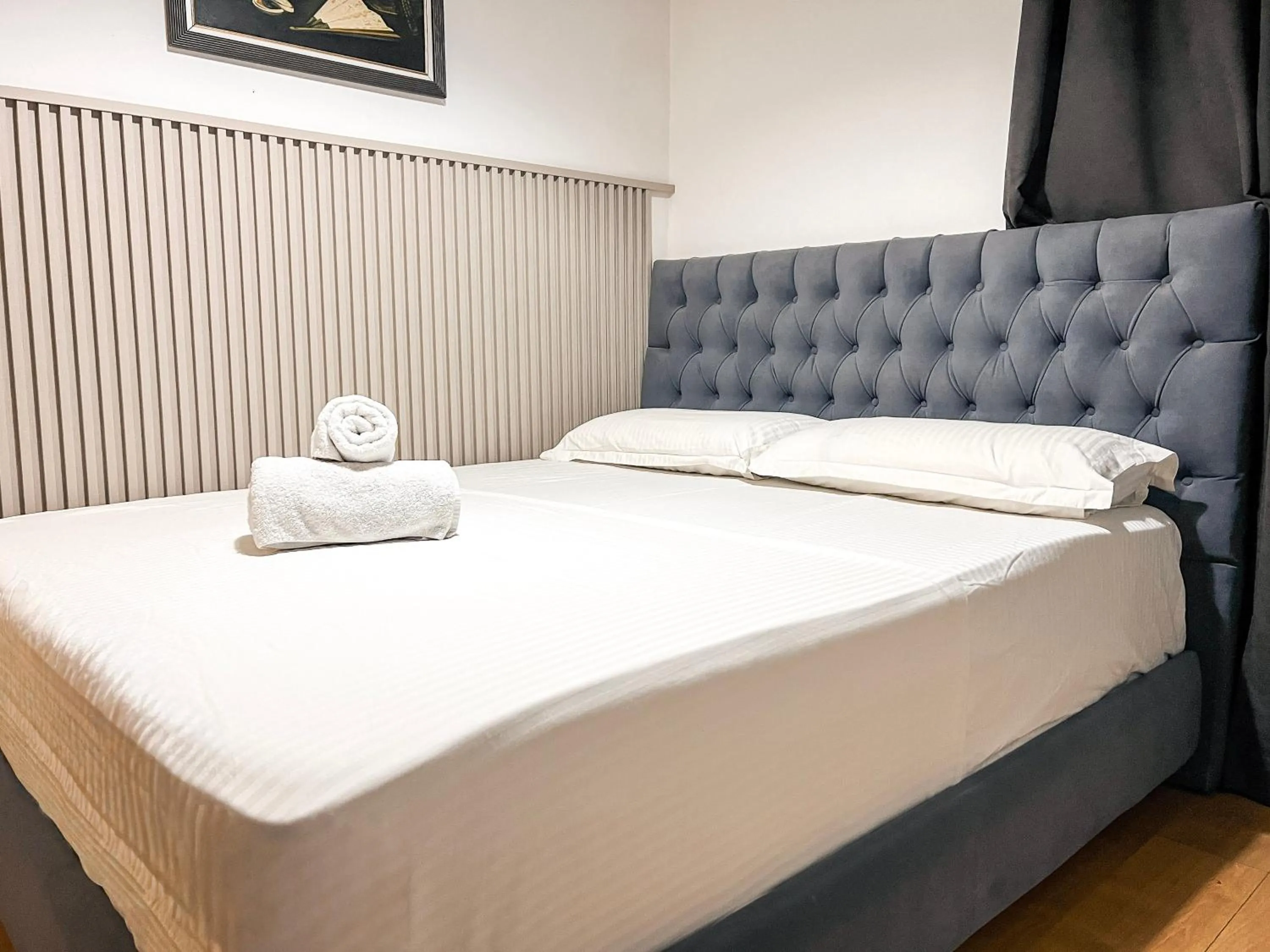 Bed in Hotel Tier Center