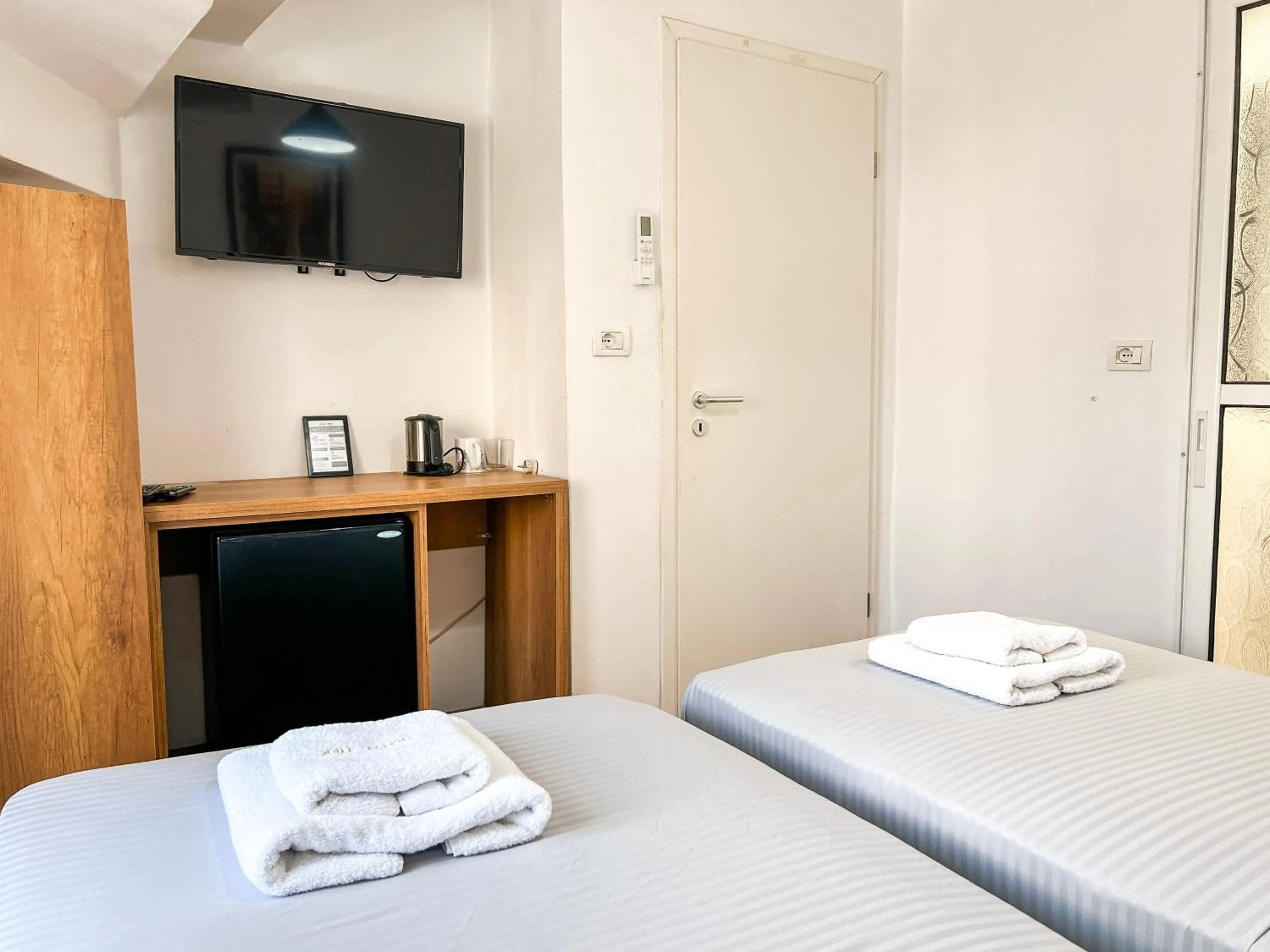 Bed in Hotel Tier Center